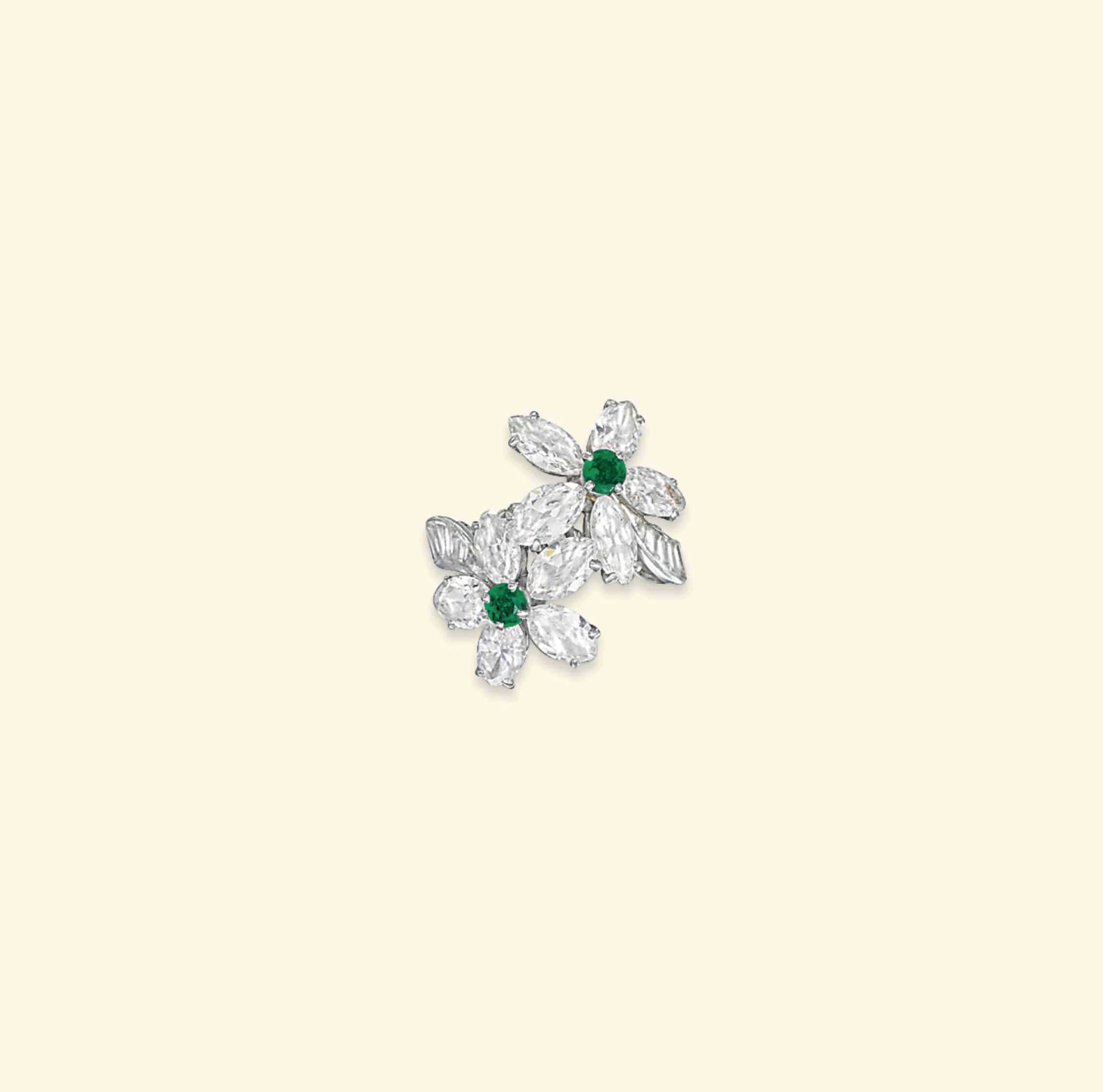 AN EMERALD AND DIAMOND RING