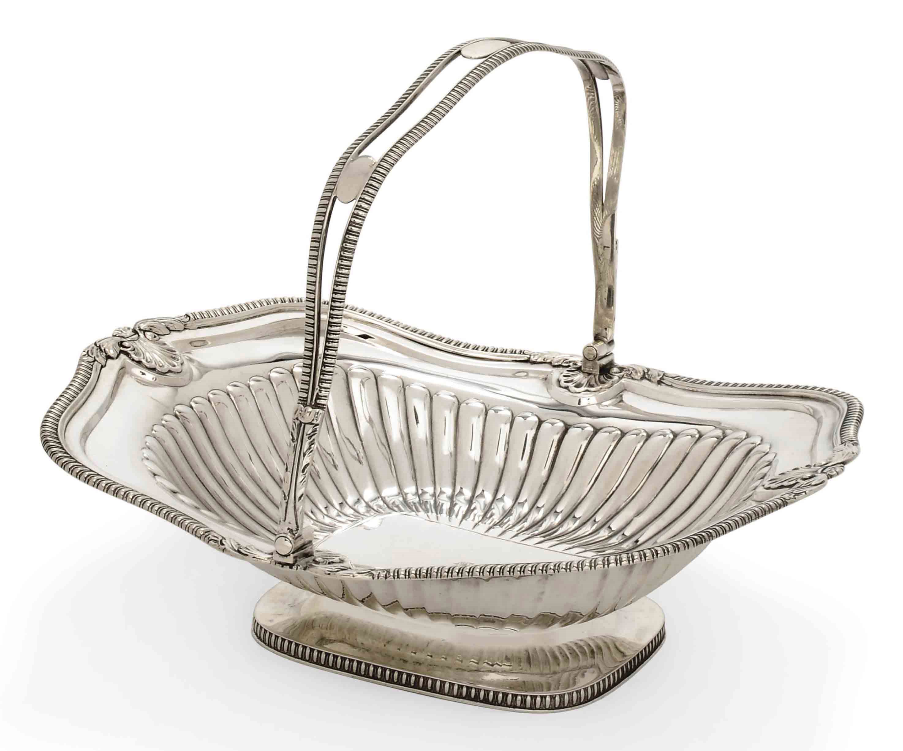 A GEORGE III SILVER SWING-HANDLED CAKE BASKET