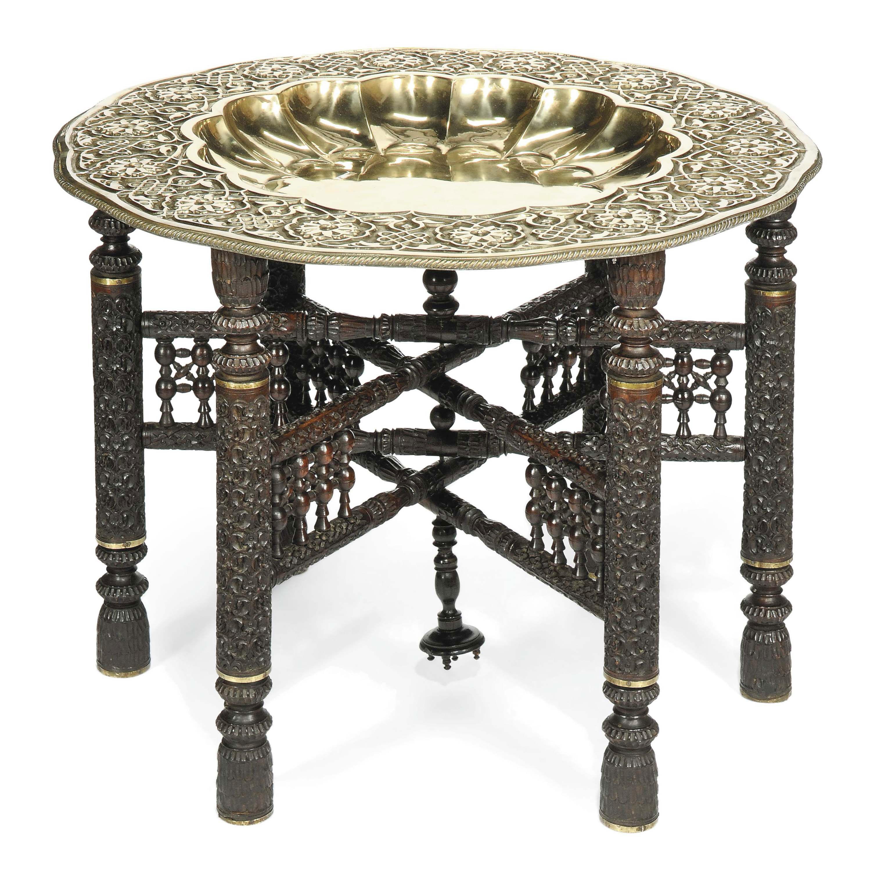 AN INDIAN EMBOSSED BRASS COFFEE TABLE