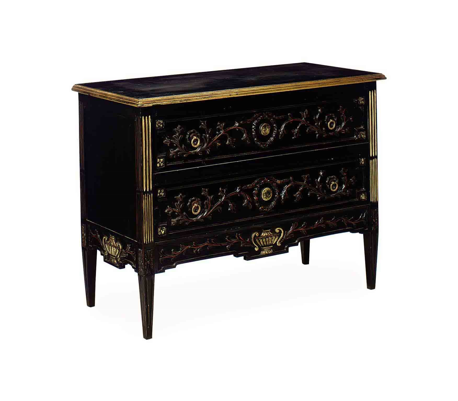 A PARCEL-GILT EBONIZED COMMODE,