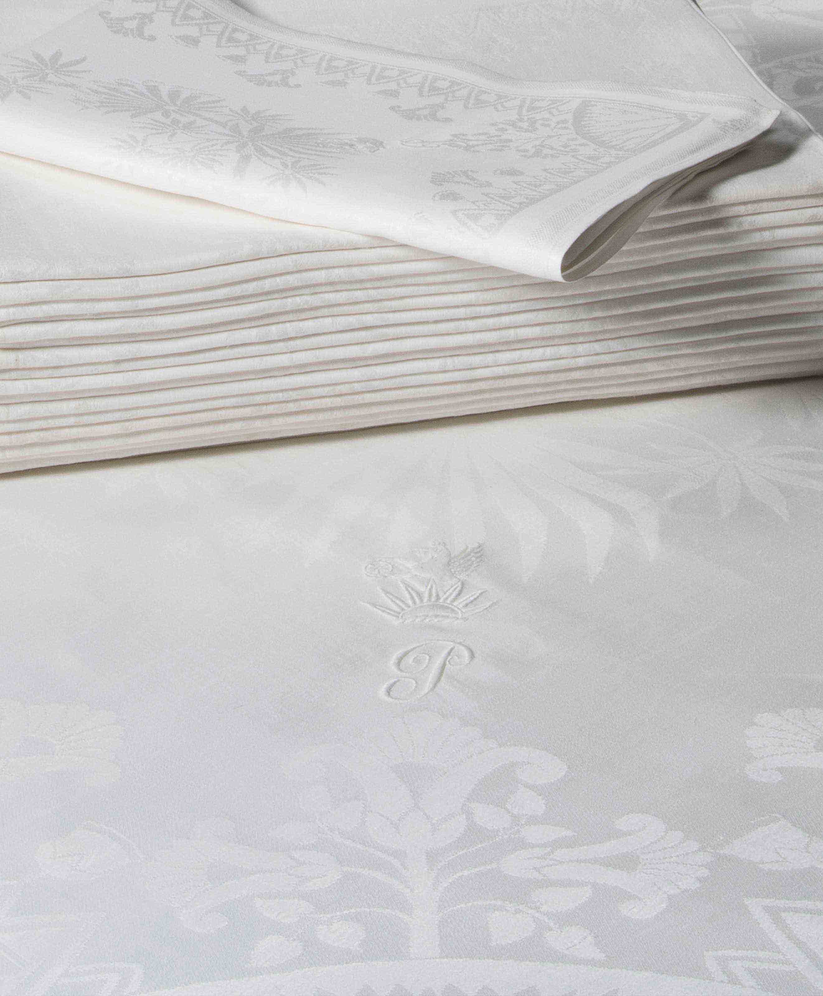 TWO TABLECLOTHS EN SUITE