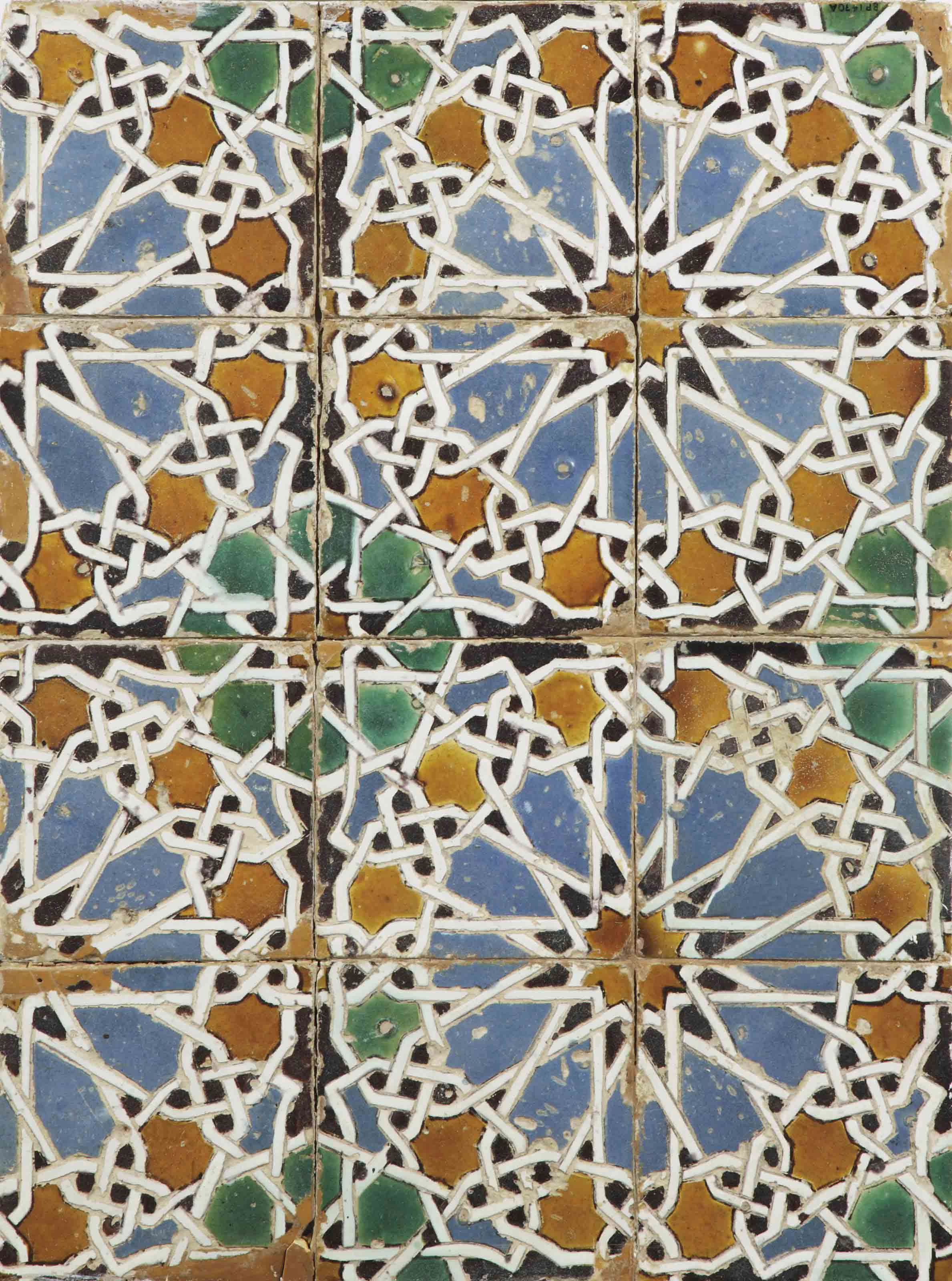 A SPANISH CUERDA SECA TILE PANEL