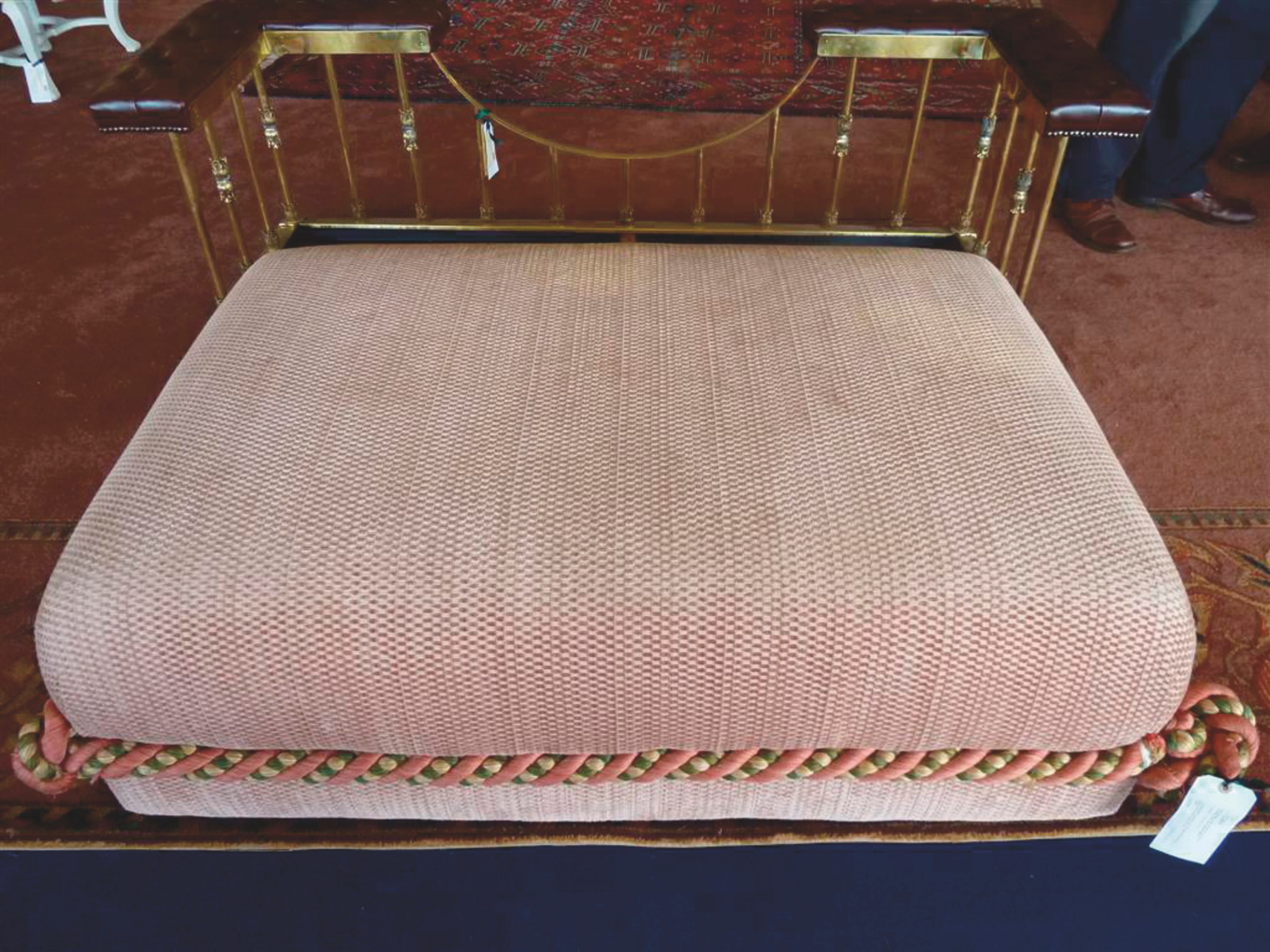 A MODERN CHENILLE-COVERED POUFFE