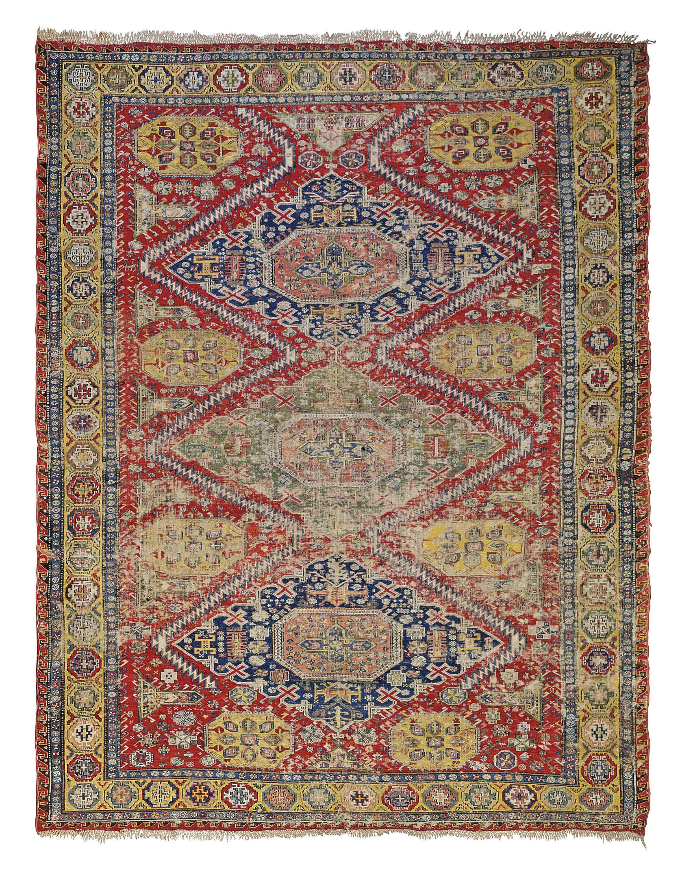 An antique Soumac carpet