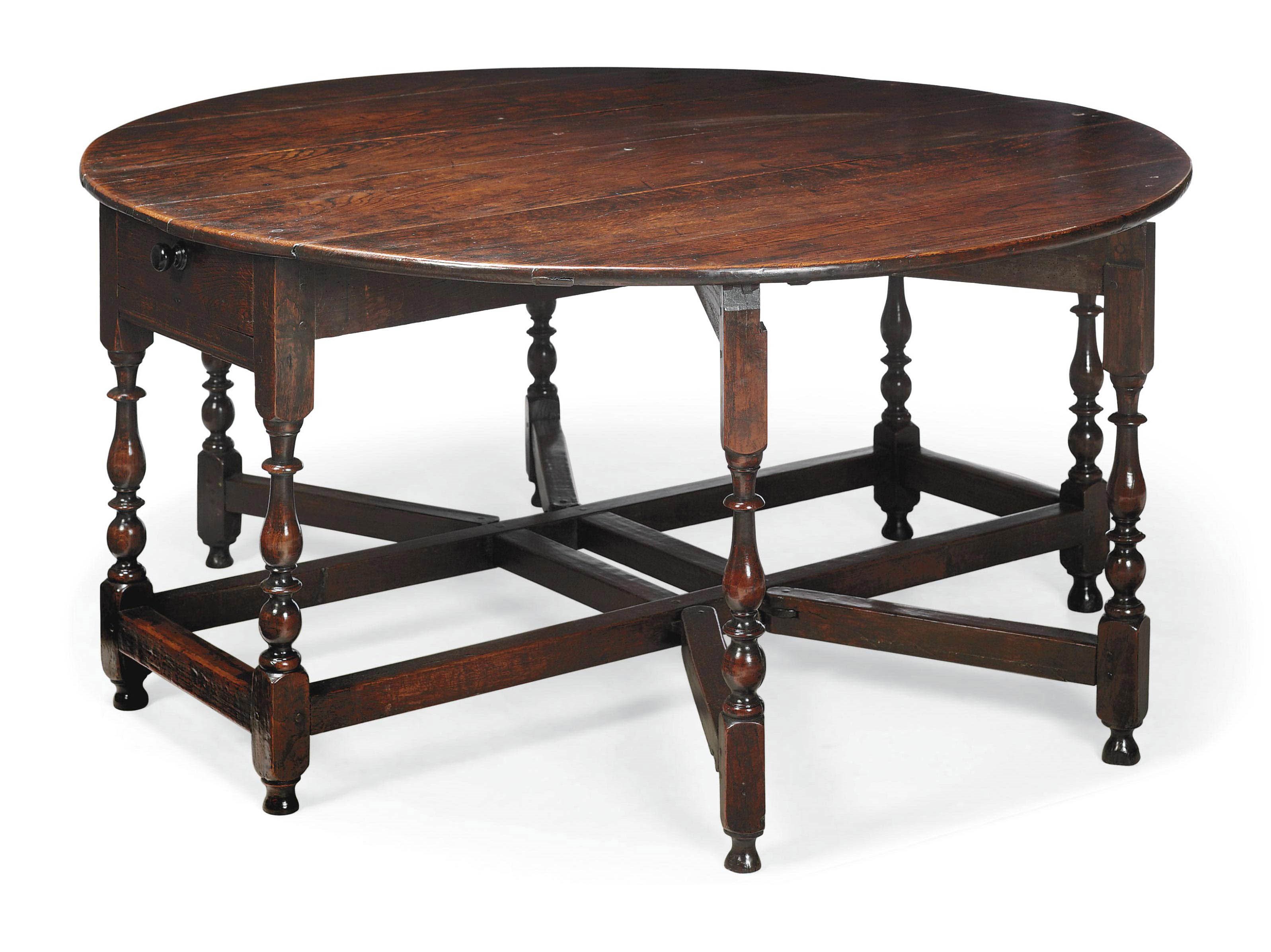 A LARGE GEORGE II OAK DOUBLE GATELEG TABLE