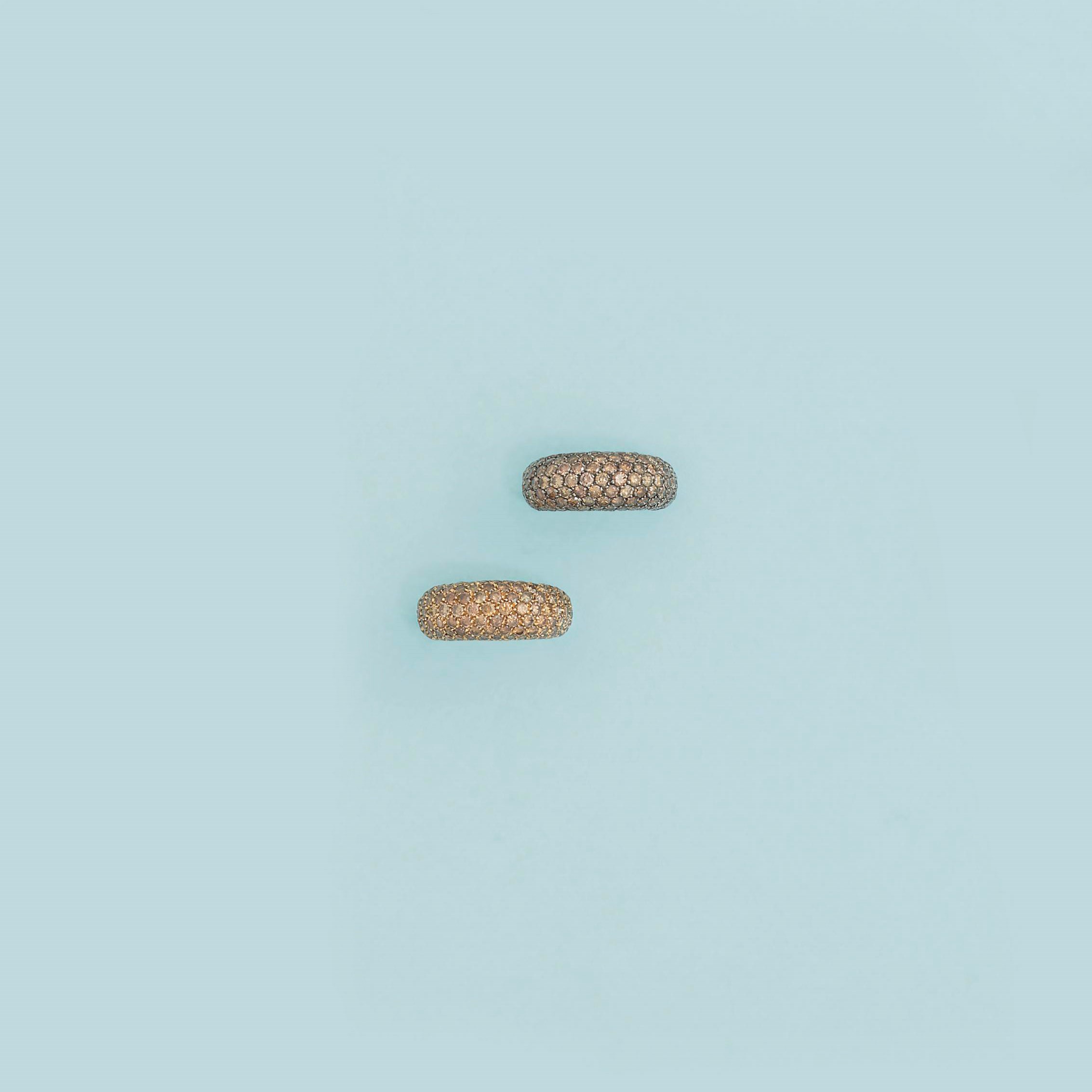 Two diamond-set rings