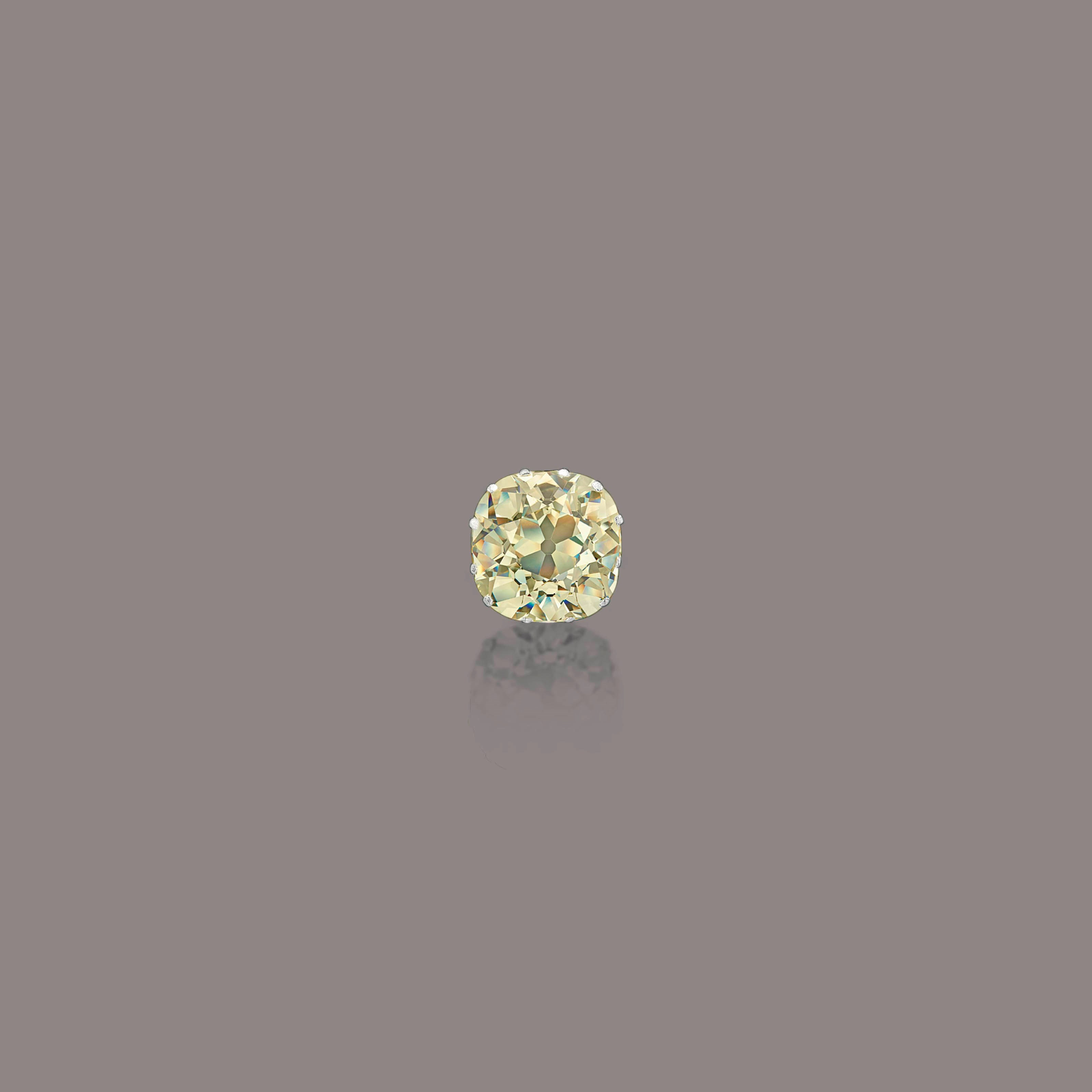 A COLOURED DIAMOND RING