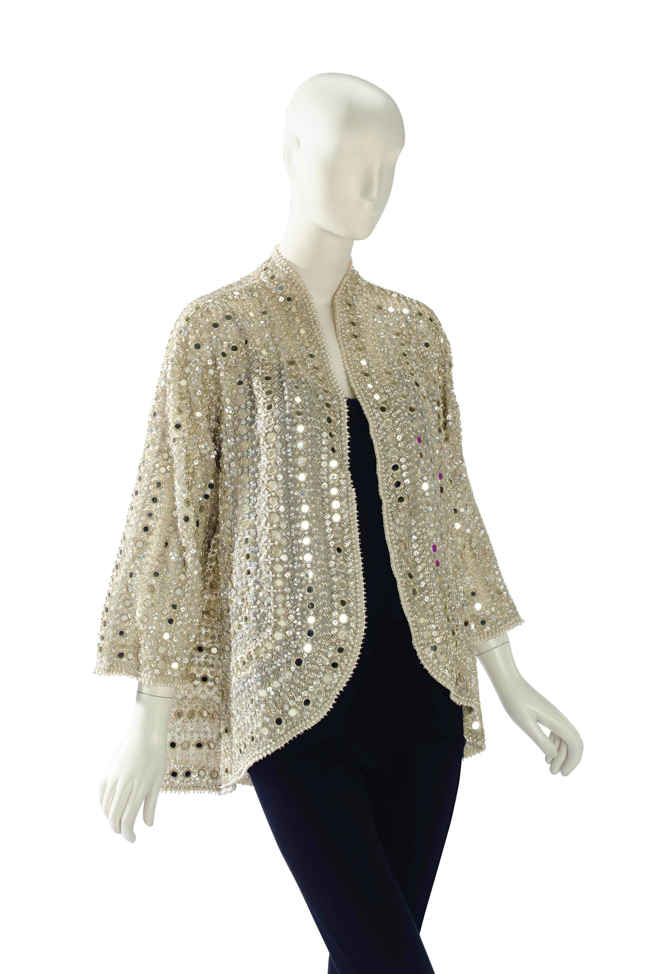 A HALSTON BEADED EVENING JACKET