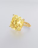 A COLOURED DIAMOND RING