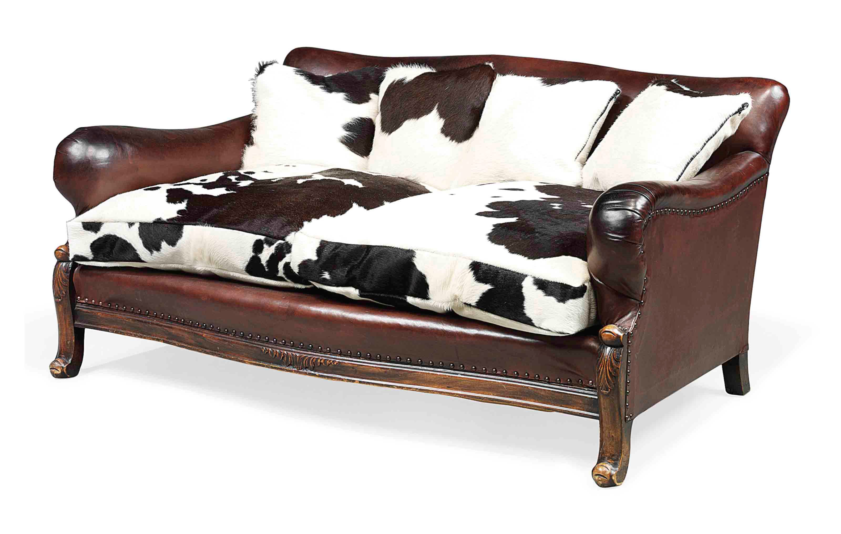 A LEATHER UPHOLSTERED WALNUT SOFA