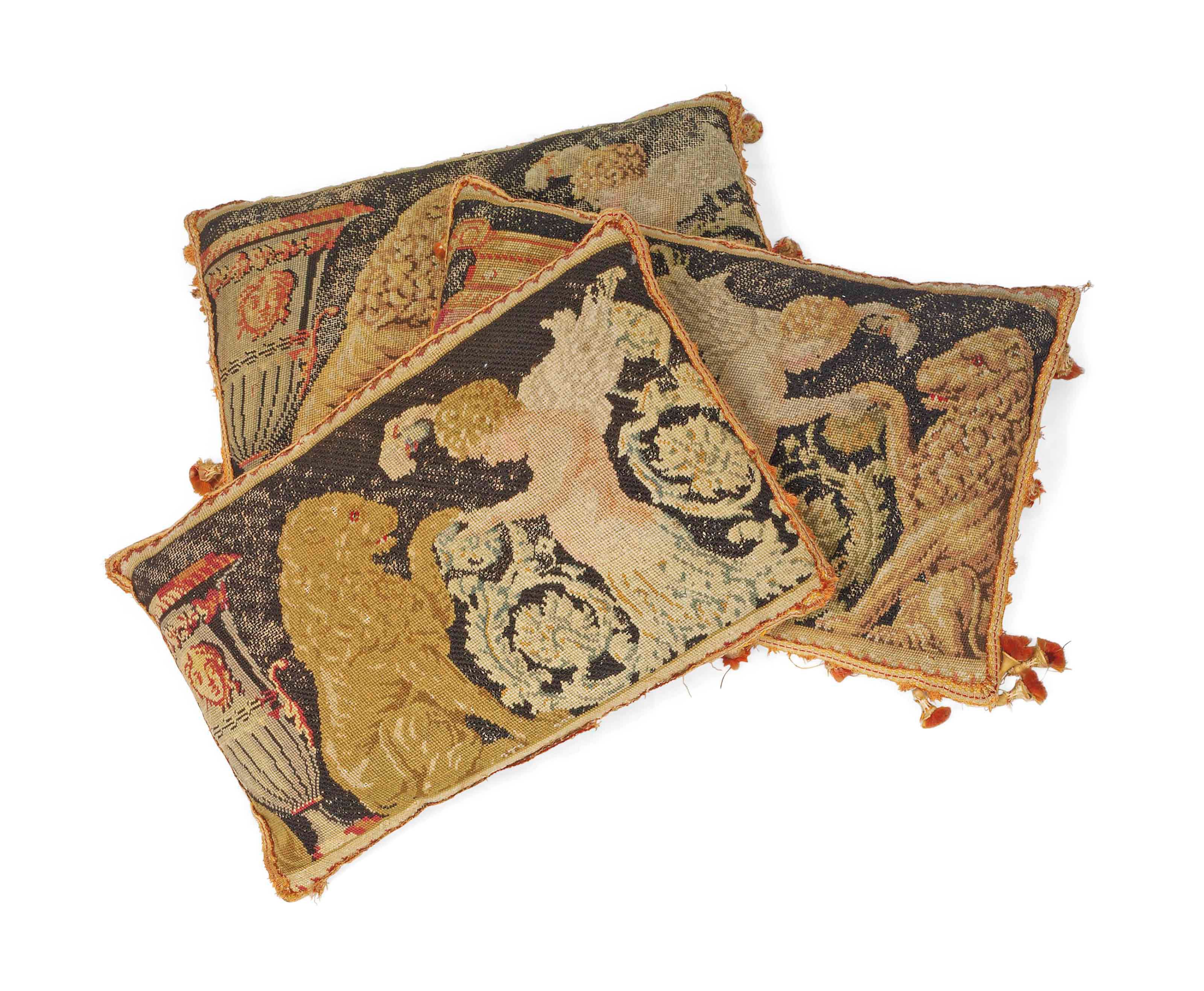 THREE TAPESTRY FRAGMENT CUSHIONS