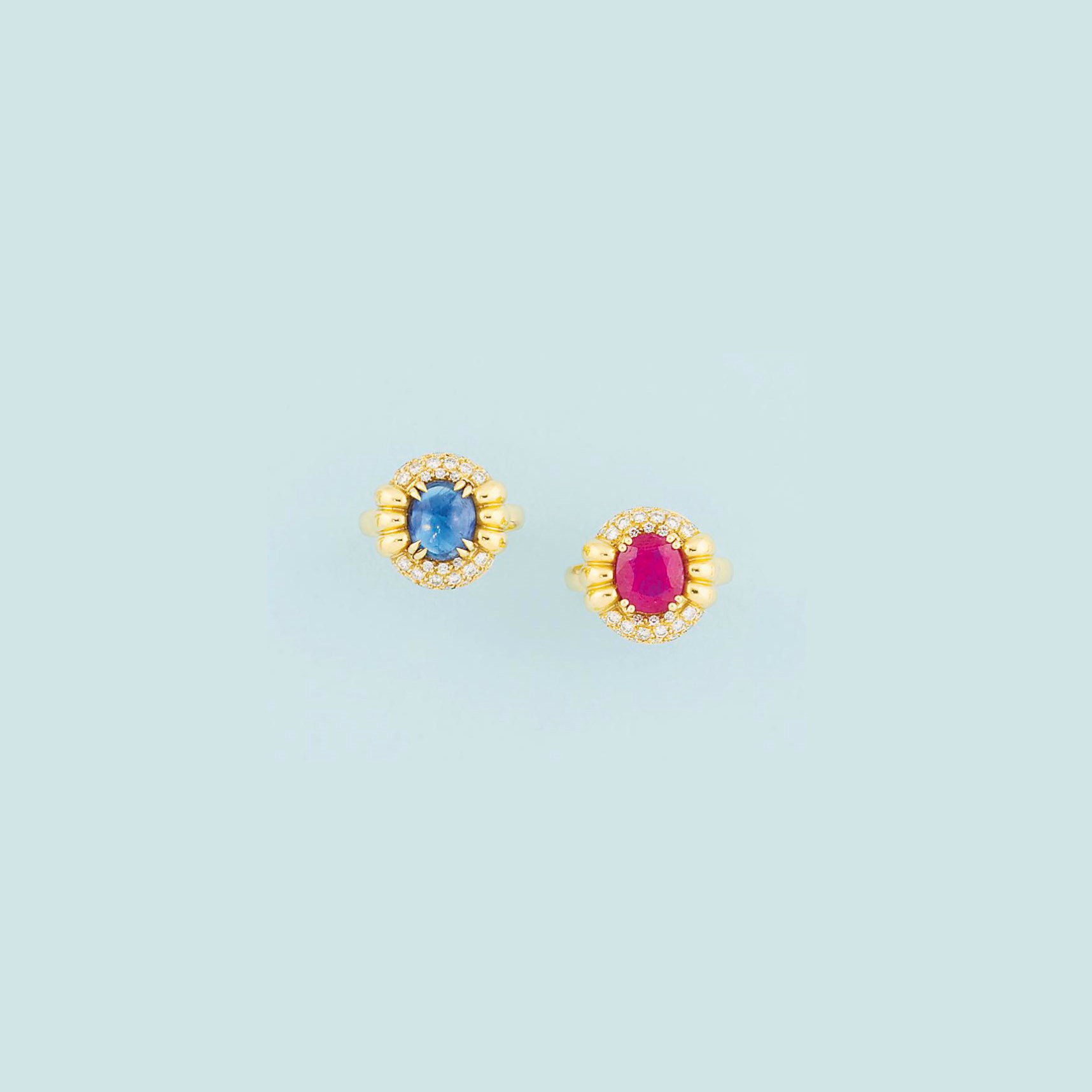 Two gem-set rings