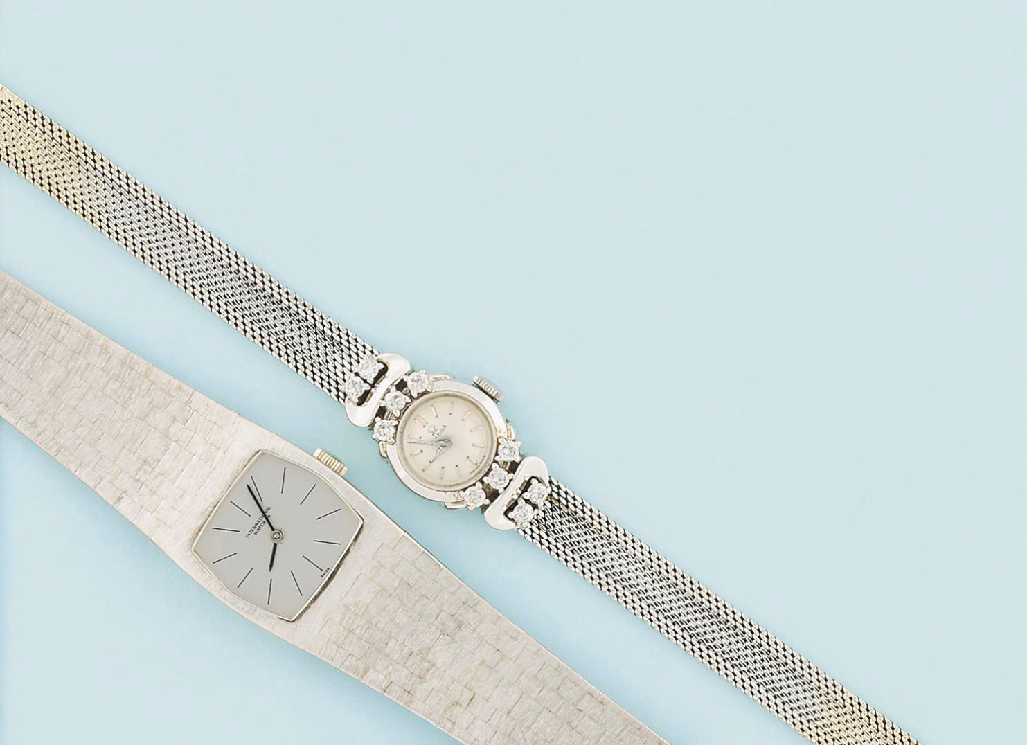 Three wristwatches