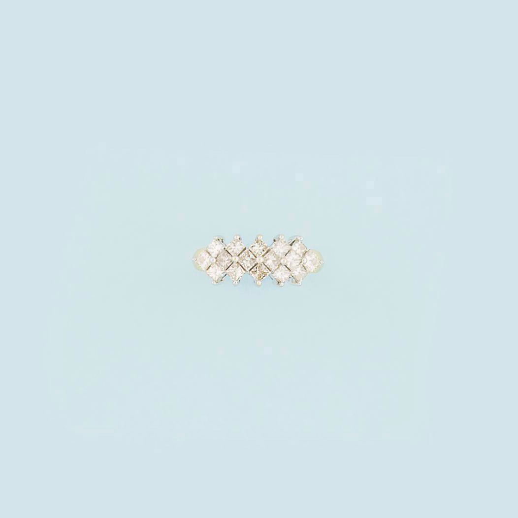 A diamond half-hoop ring