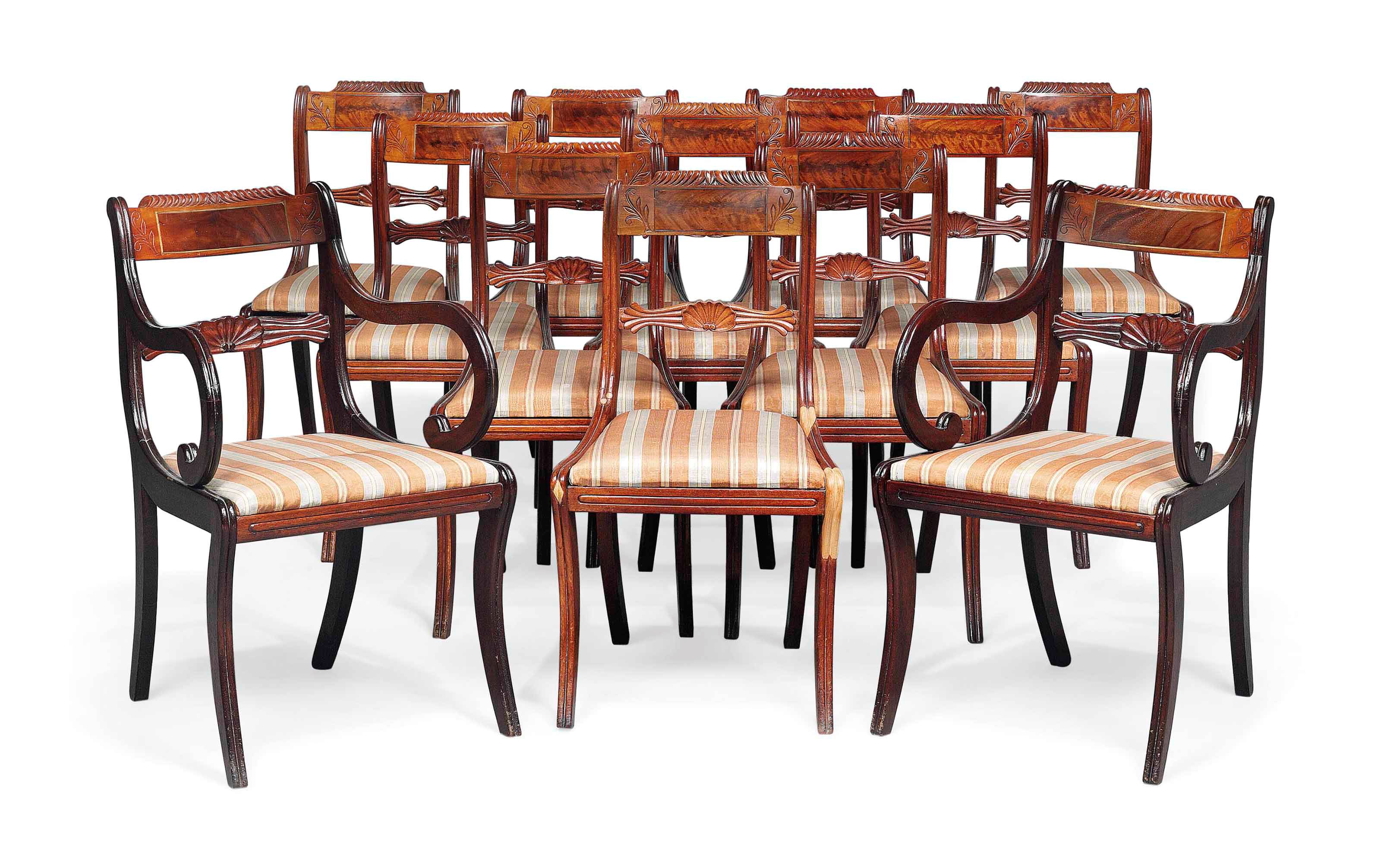 A SET OF TWELVE REGENCY MAHOGANY DINING CHAIRS