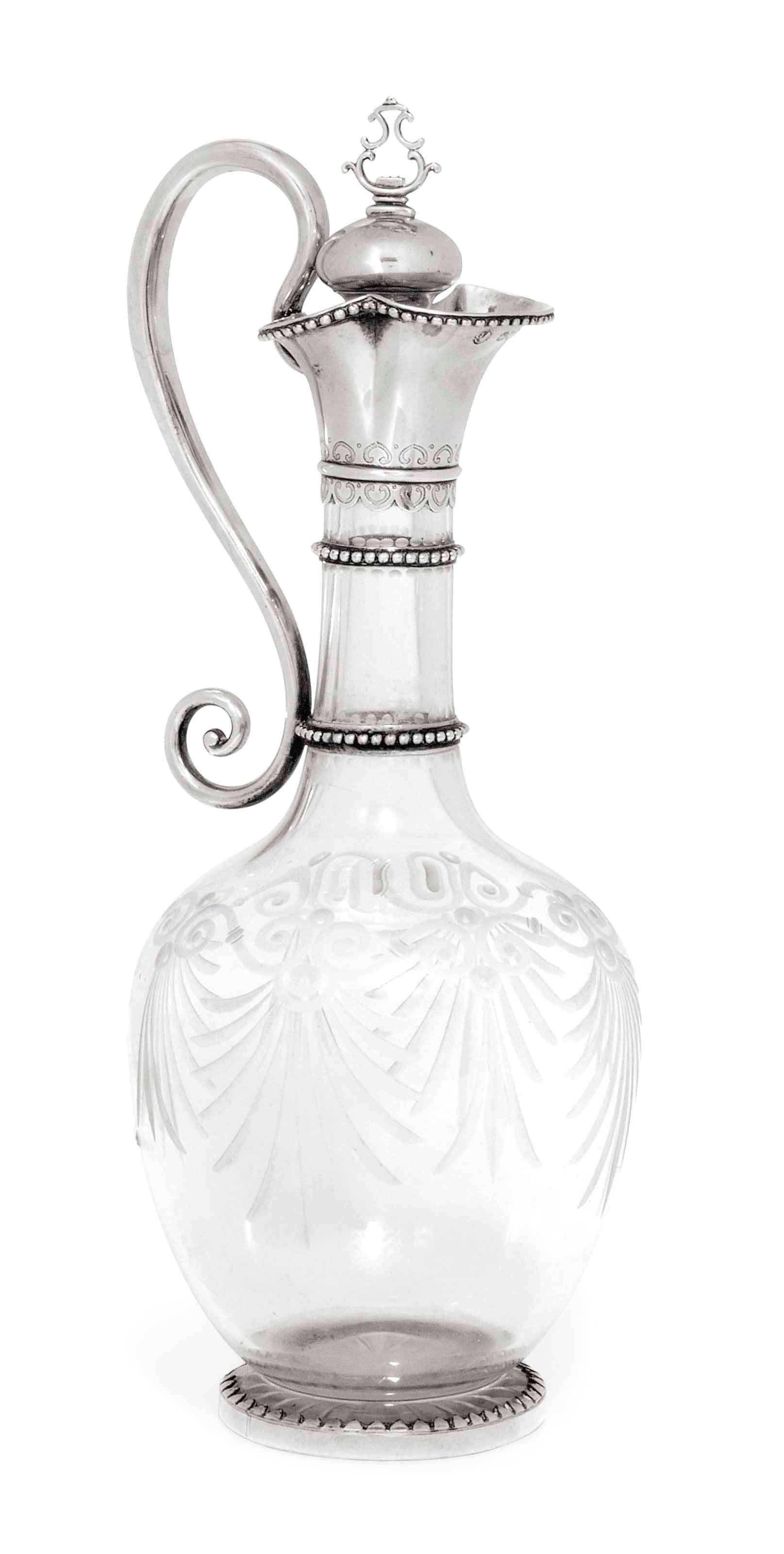 A VICTORIAN SILVER-MOUNTED CUT-GLASS CLARET JUG