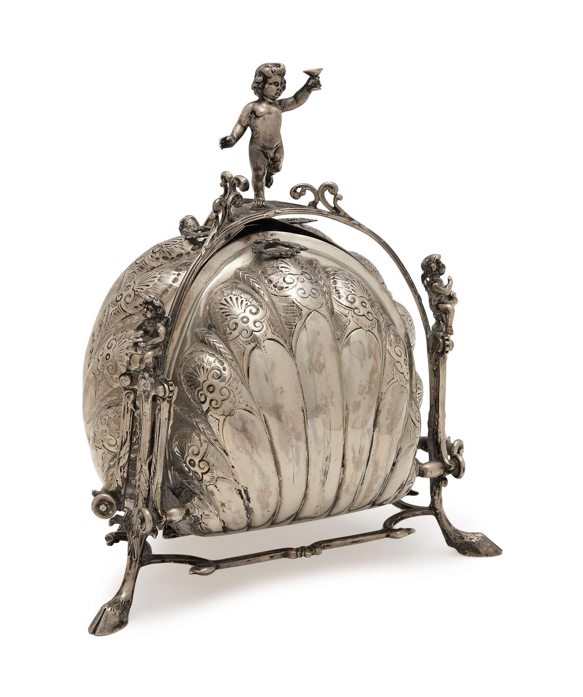 A GERMAN SILVER SHELL-FORM BUN WARMER,