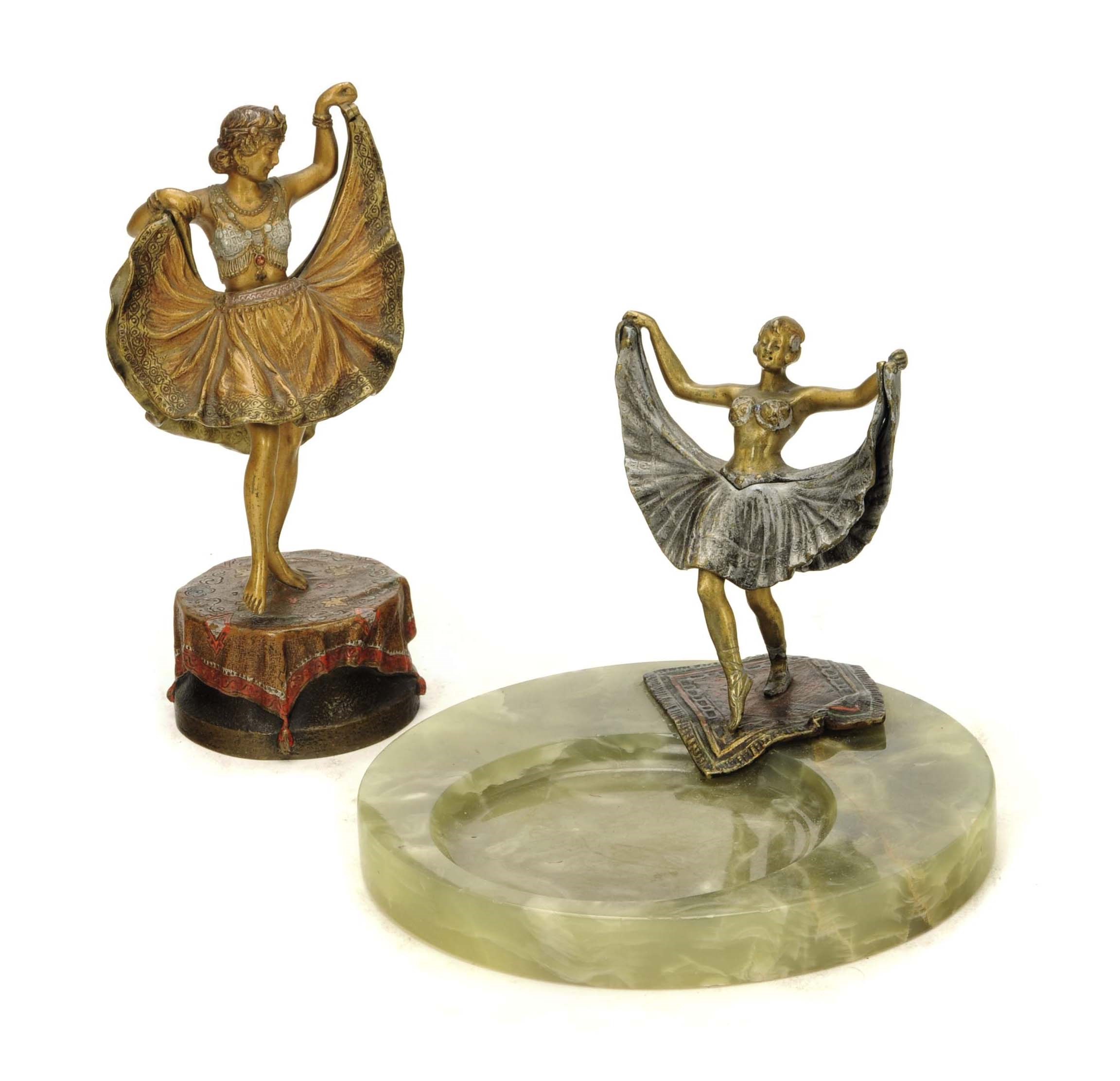 A CONTINENTAL COLD-PAINTED BRONZE FIGURE OF A DANCING LADY WITH HINGED SKIRT,