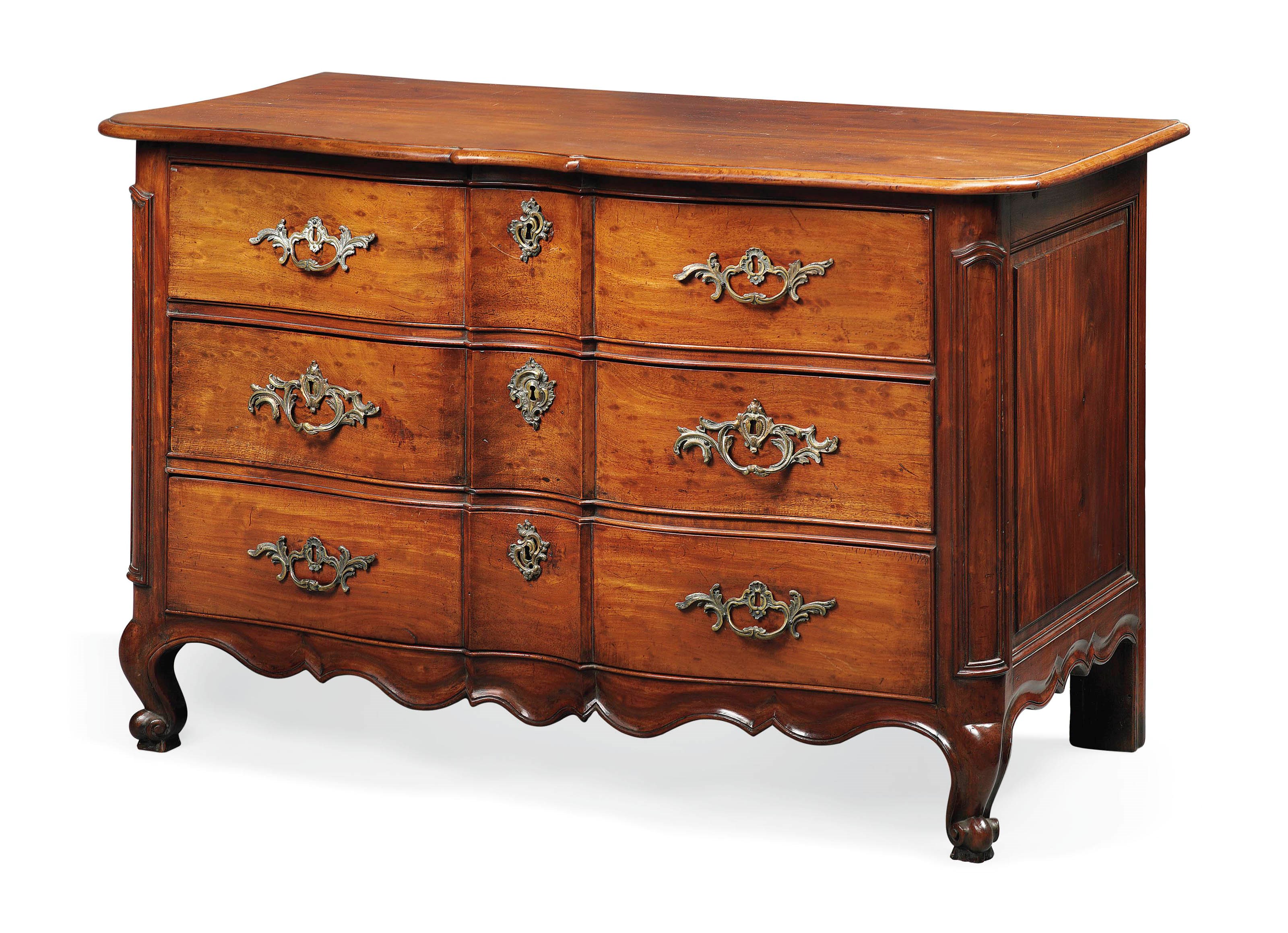 A FRENCH PROVINCIAL 'ACAJOU MOUCHETE' OR PLUM-PUDDING MAHOGANY COMMODE