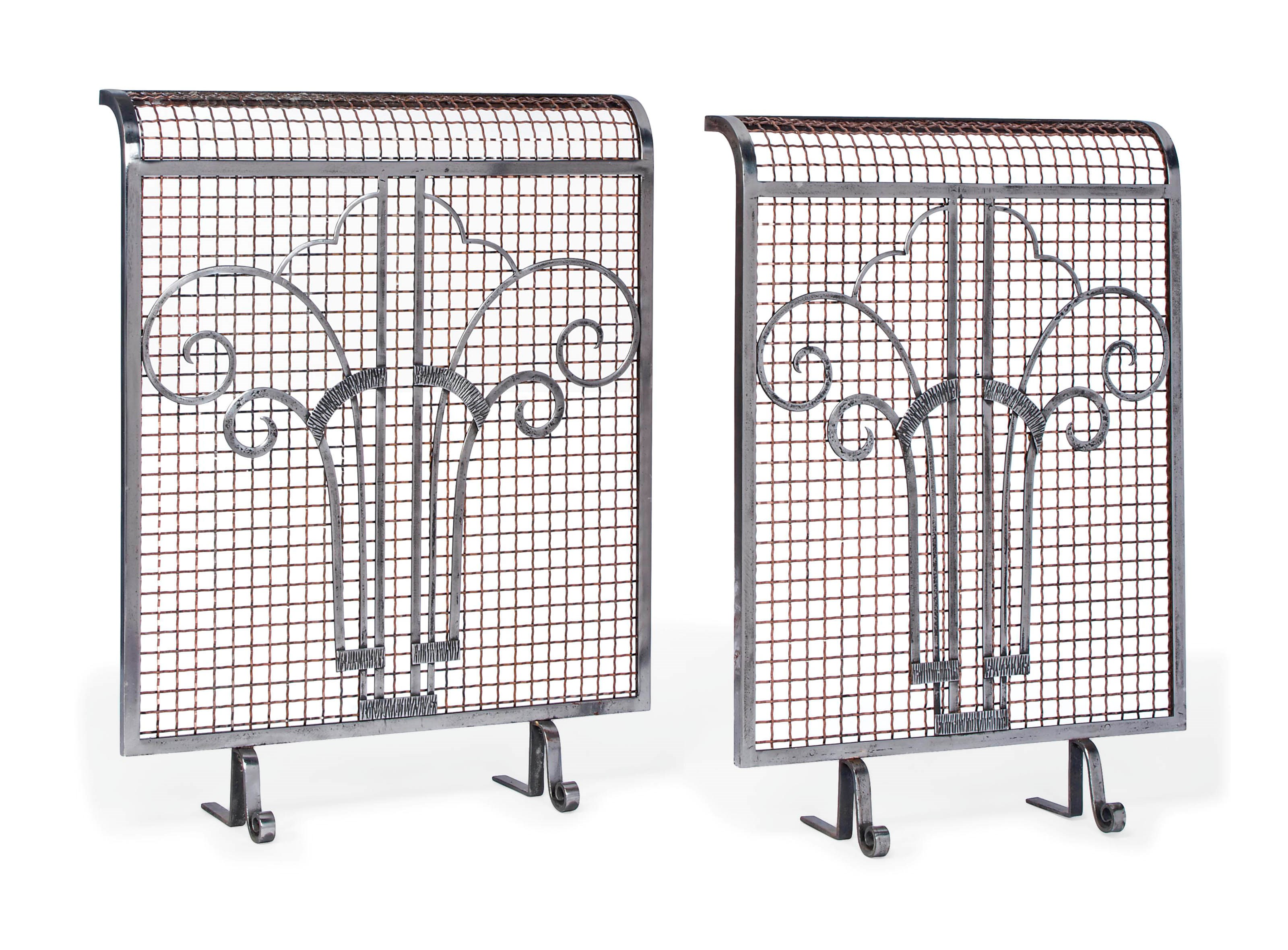 A PAIR OF ART DECO STEEL AND COPPER-PLATED FIRE-GUARDS