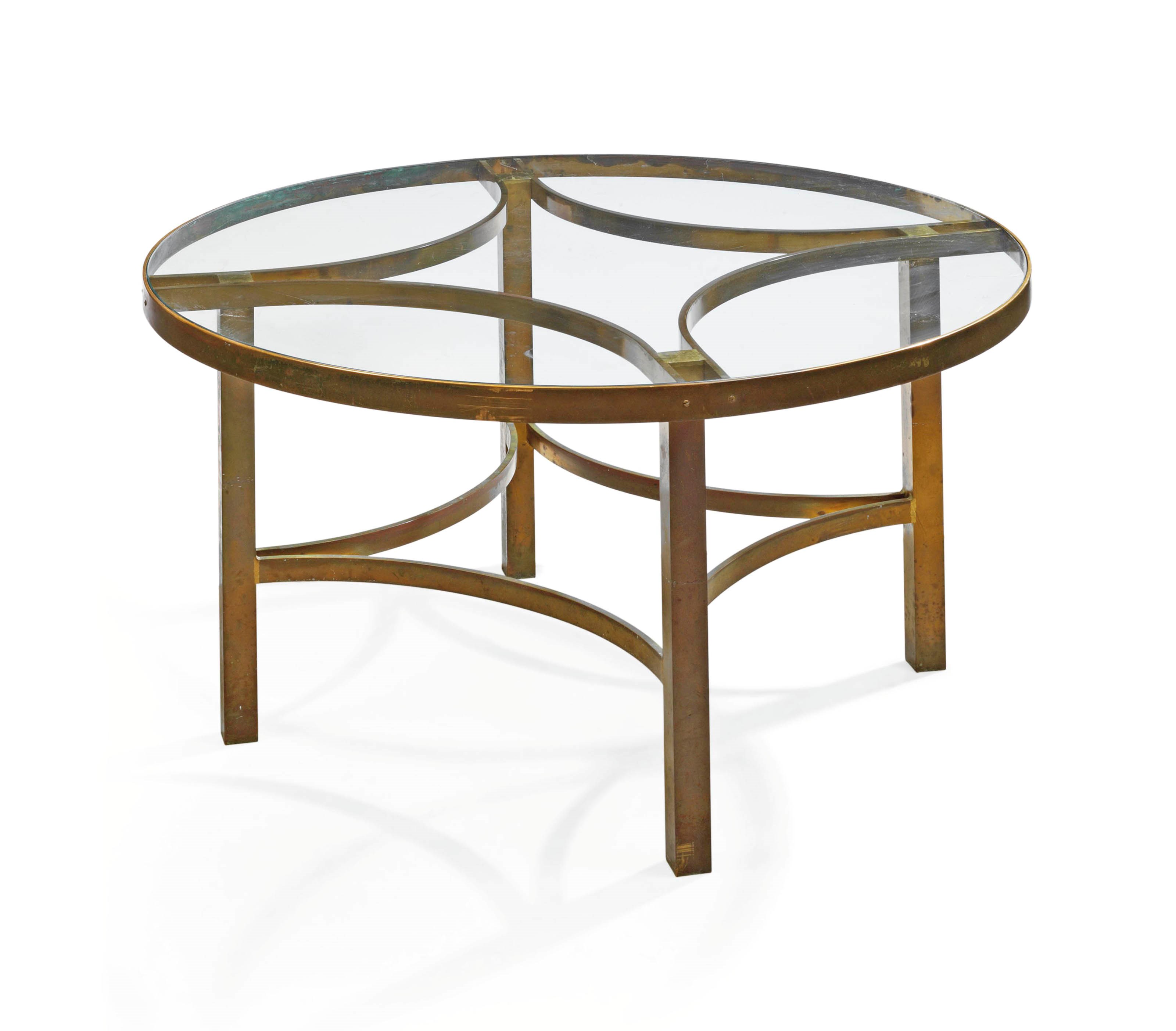 A BRASS AND GLASS CENTRE TABLE IN THE STYLE OF ERWIN & ESTELLE LAVERNE