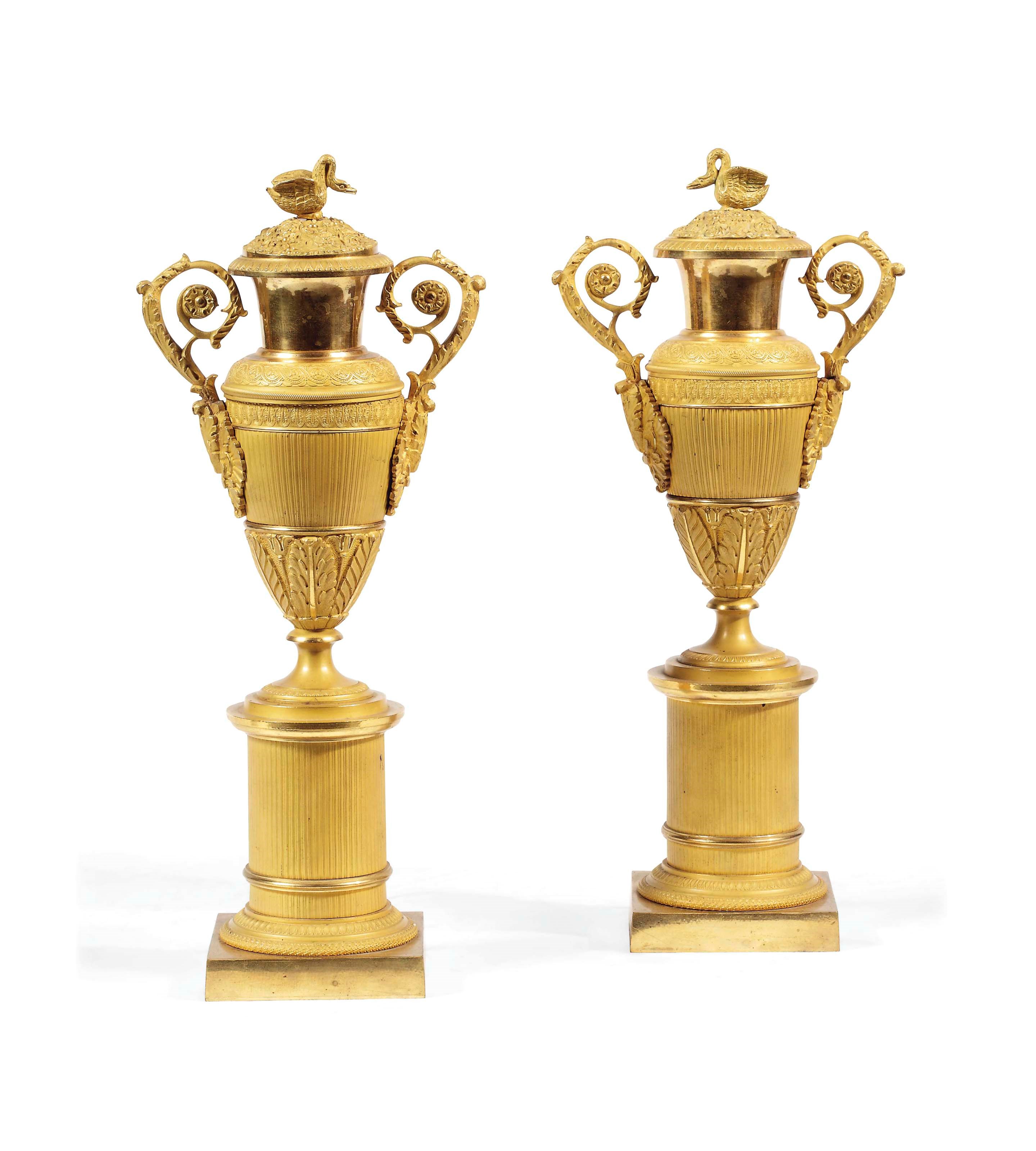 A pair of Restauration ormolu cassolettes