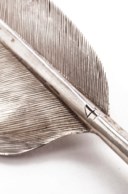 A Dutch silver and silver-gilt prize quill pen in the form of a feather