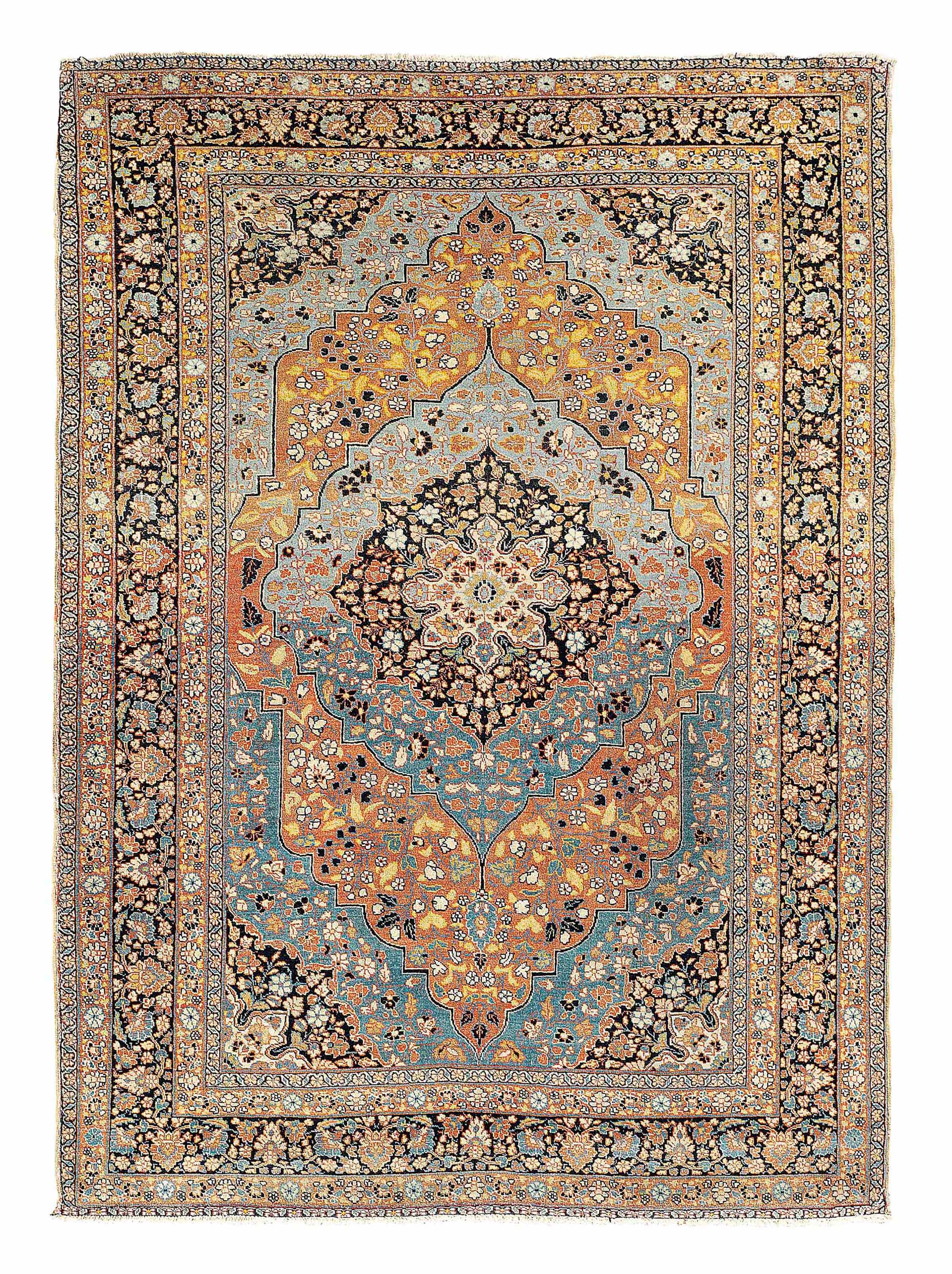 An antique Tabriz rug