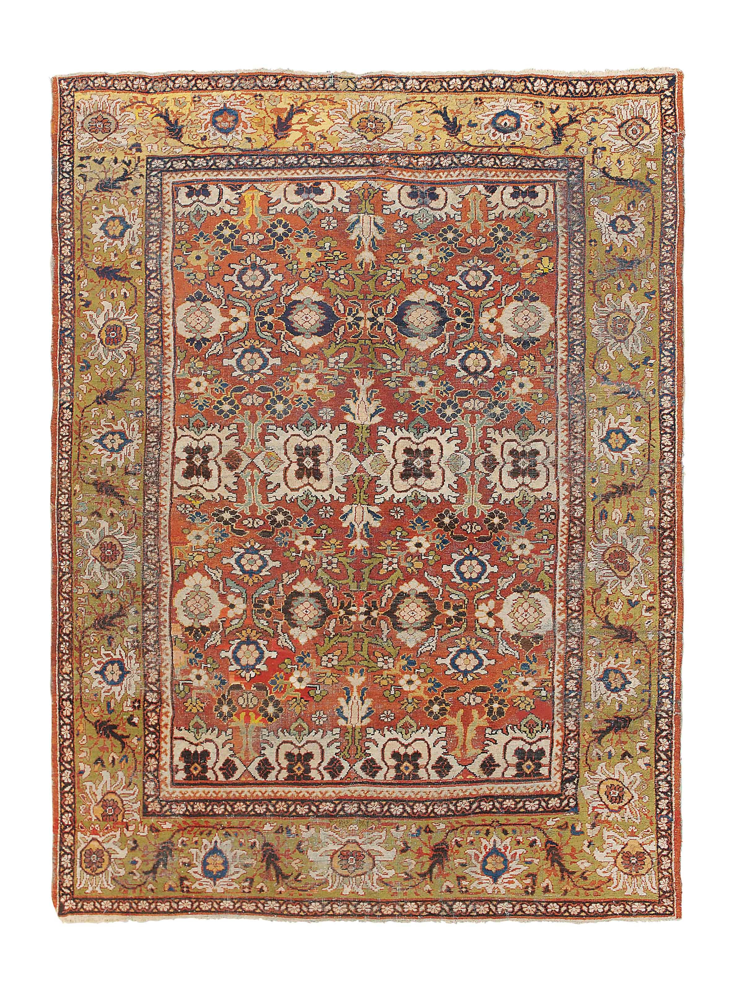 An antique Mahal carpet
