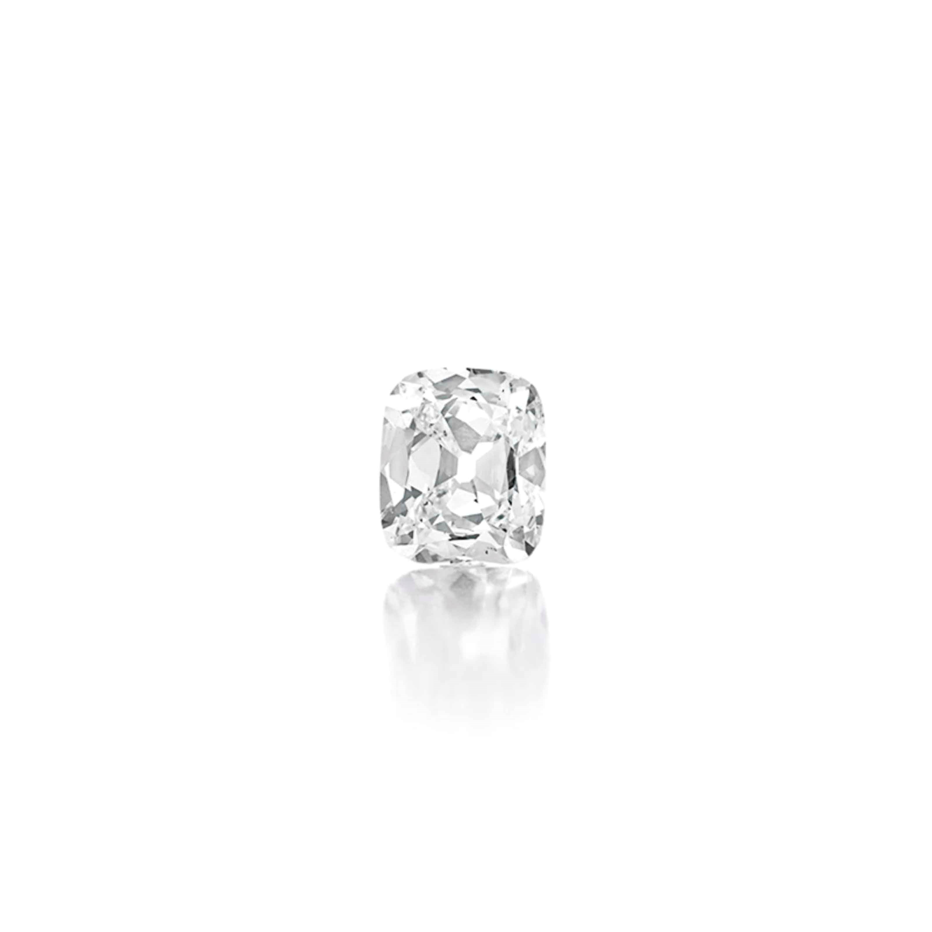 AN UNMOUNTED CUSHION-CUT DIAMOND