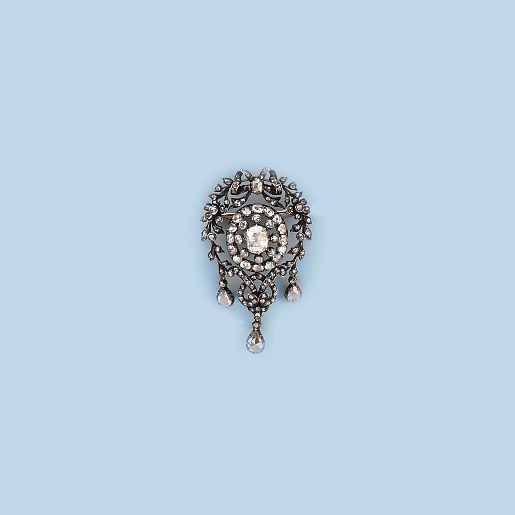 A ROSE-CUT DIAMOND BROOCH