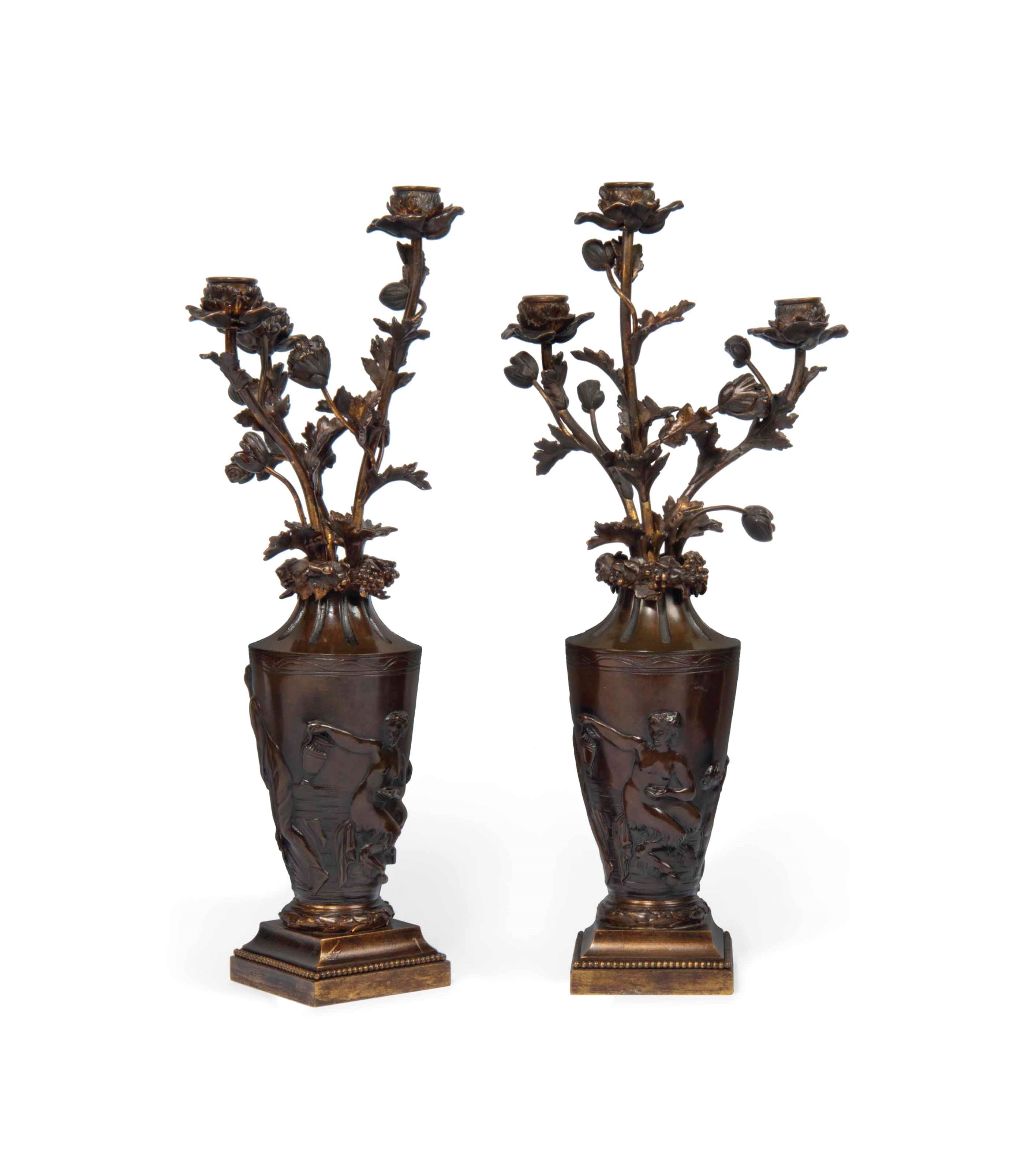 A PAIR OF FRENCH BRONZE THREE-LIGHT CANDELABRA