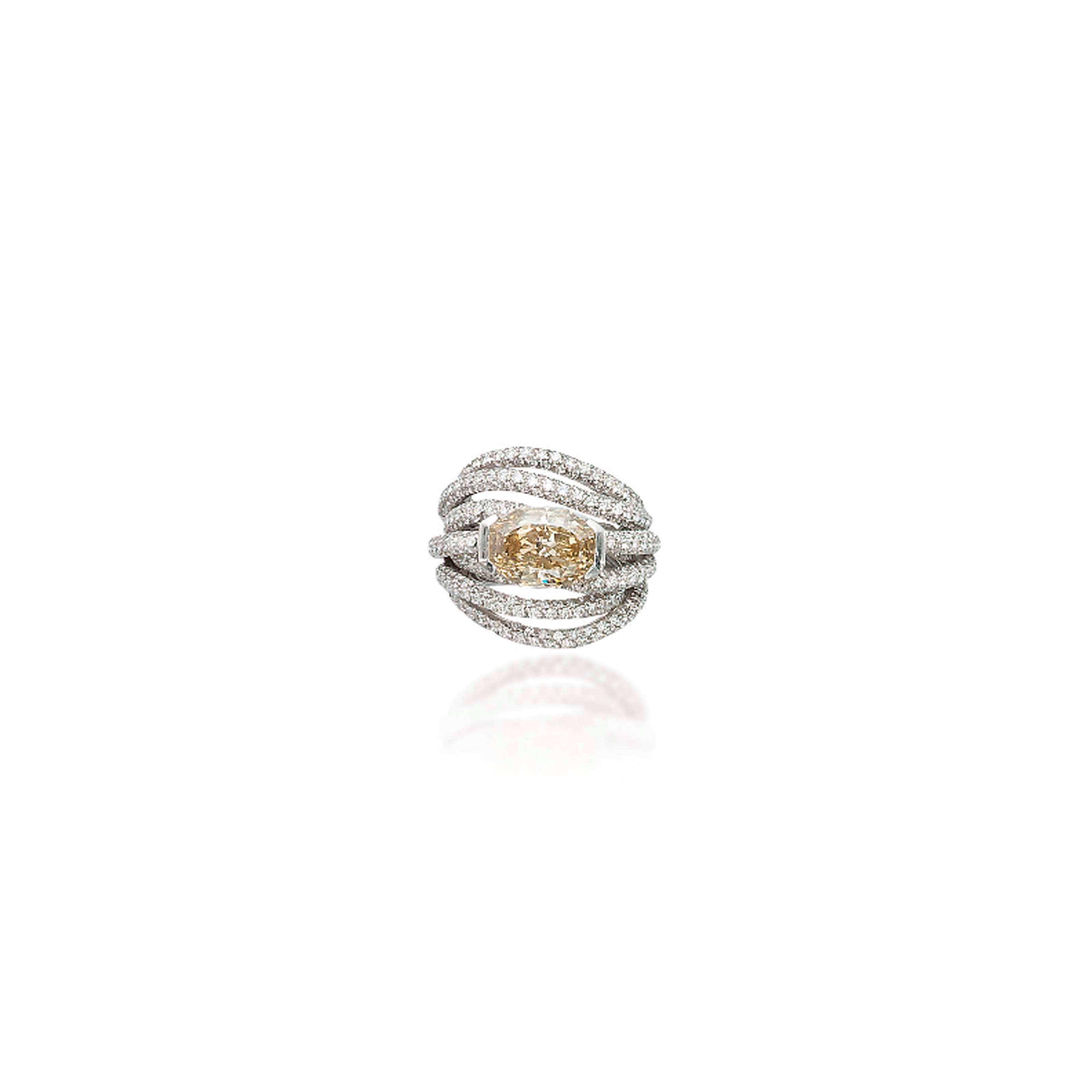 A COLOURED DIAMOND RING