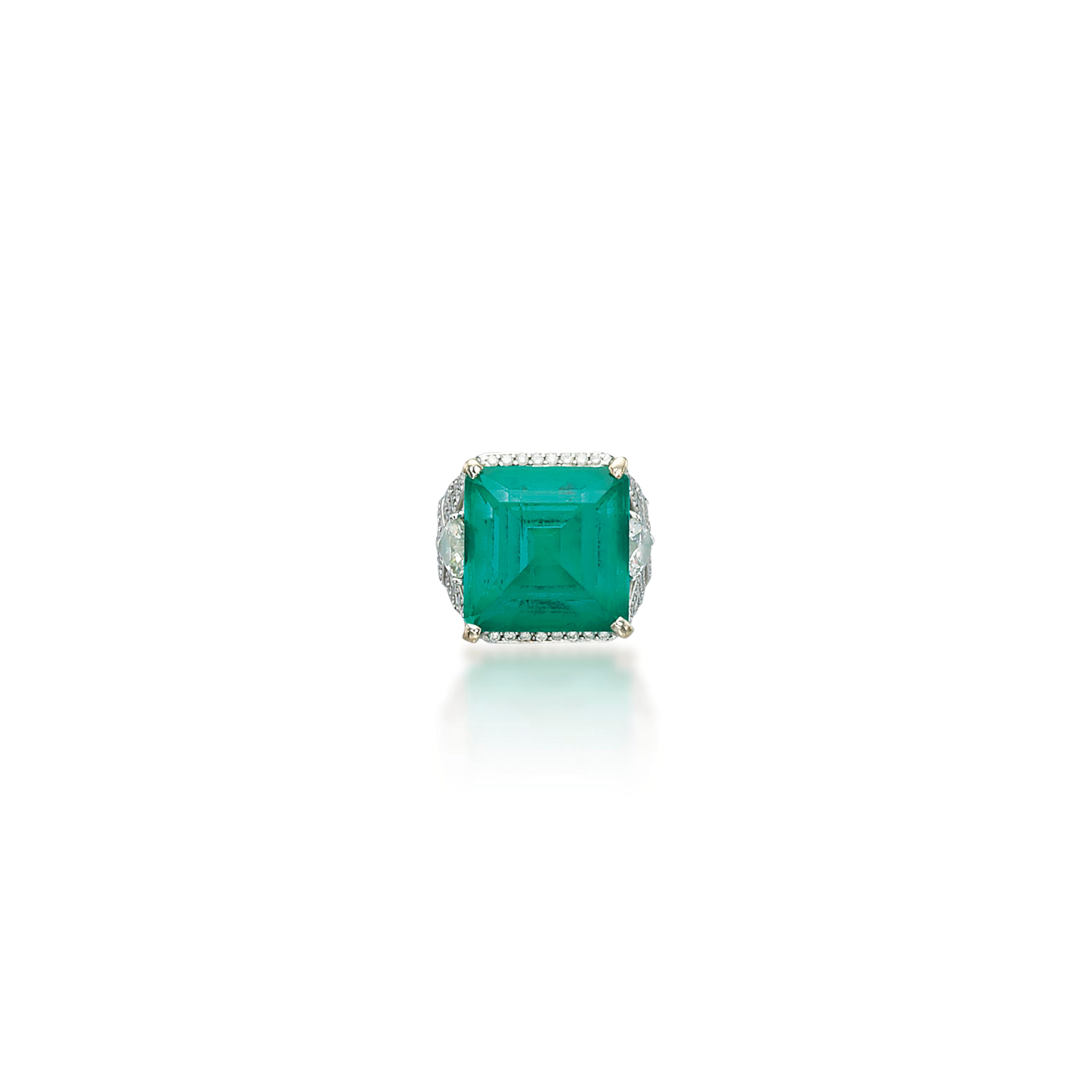 AN EMERALD AND DIAMOND RING
