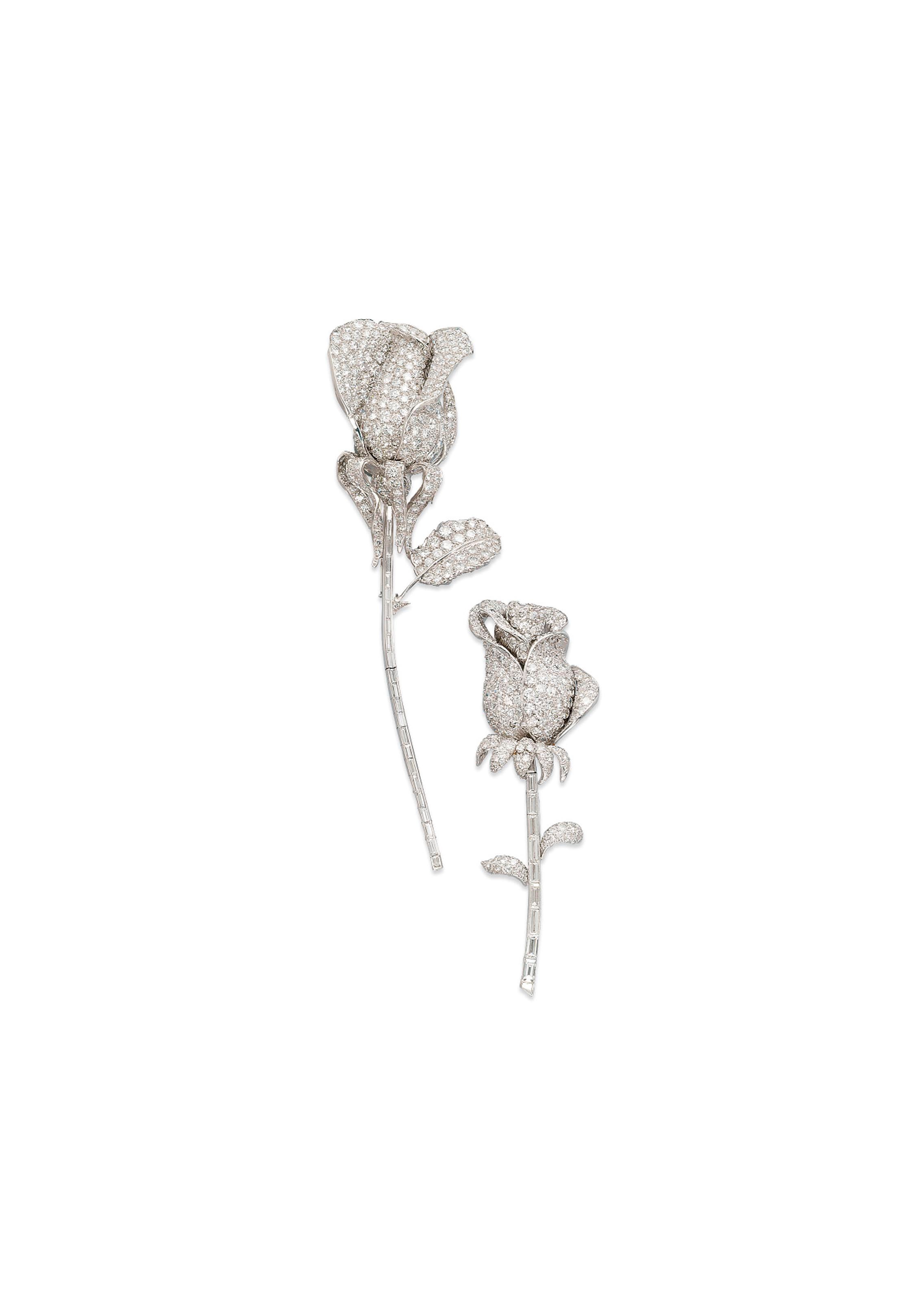 TWO DIAMOND FLOWER BROOCHES