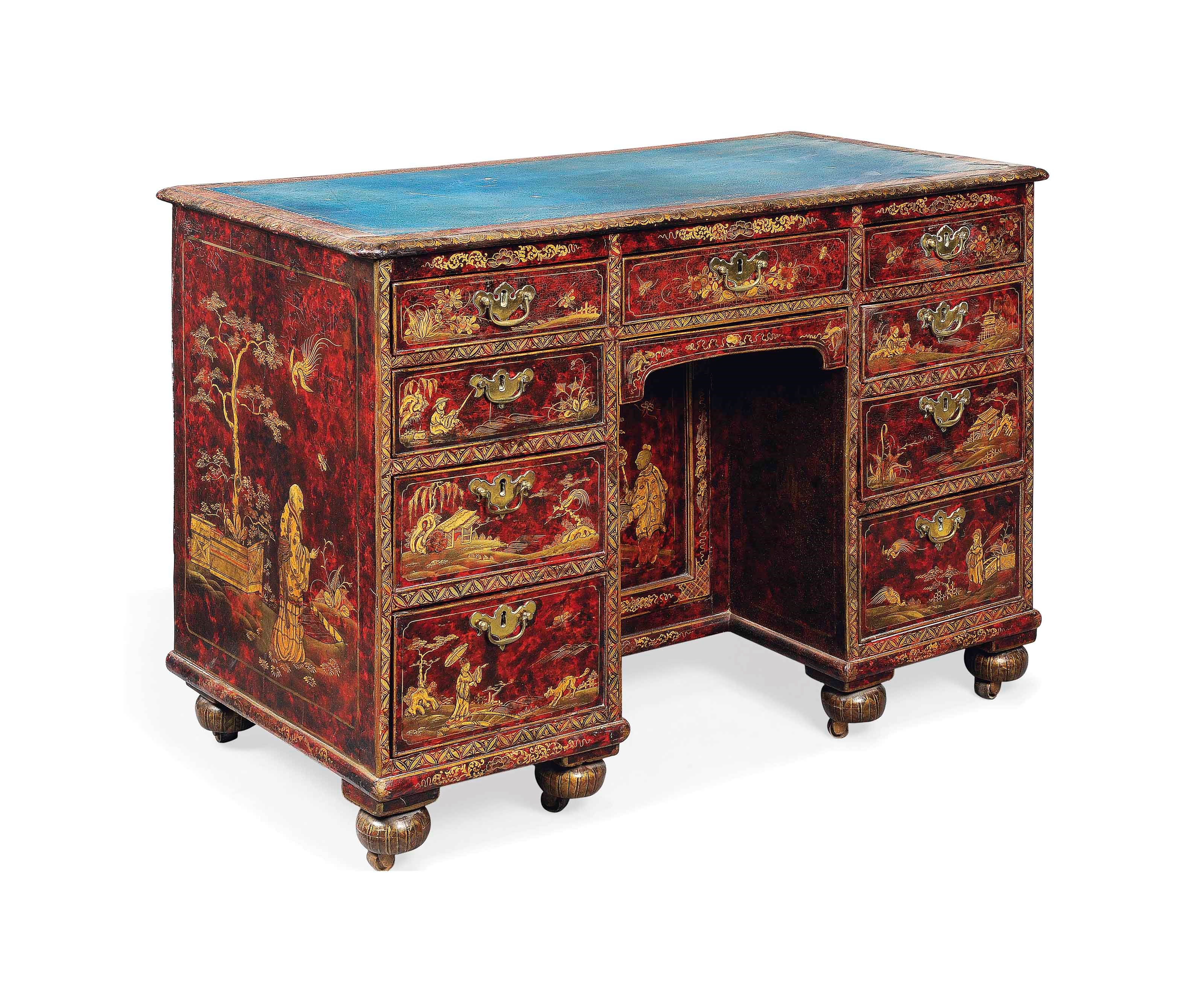 A PARCEL-GILT DECORATED SIMULATED TORTOISESHELL JAPANNED KNEE-HOLE DESK