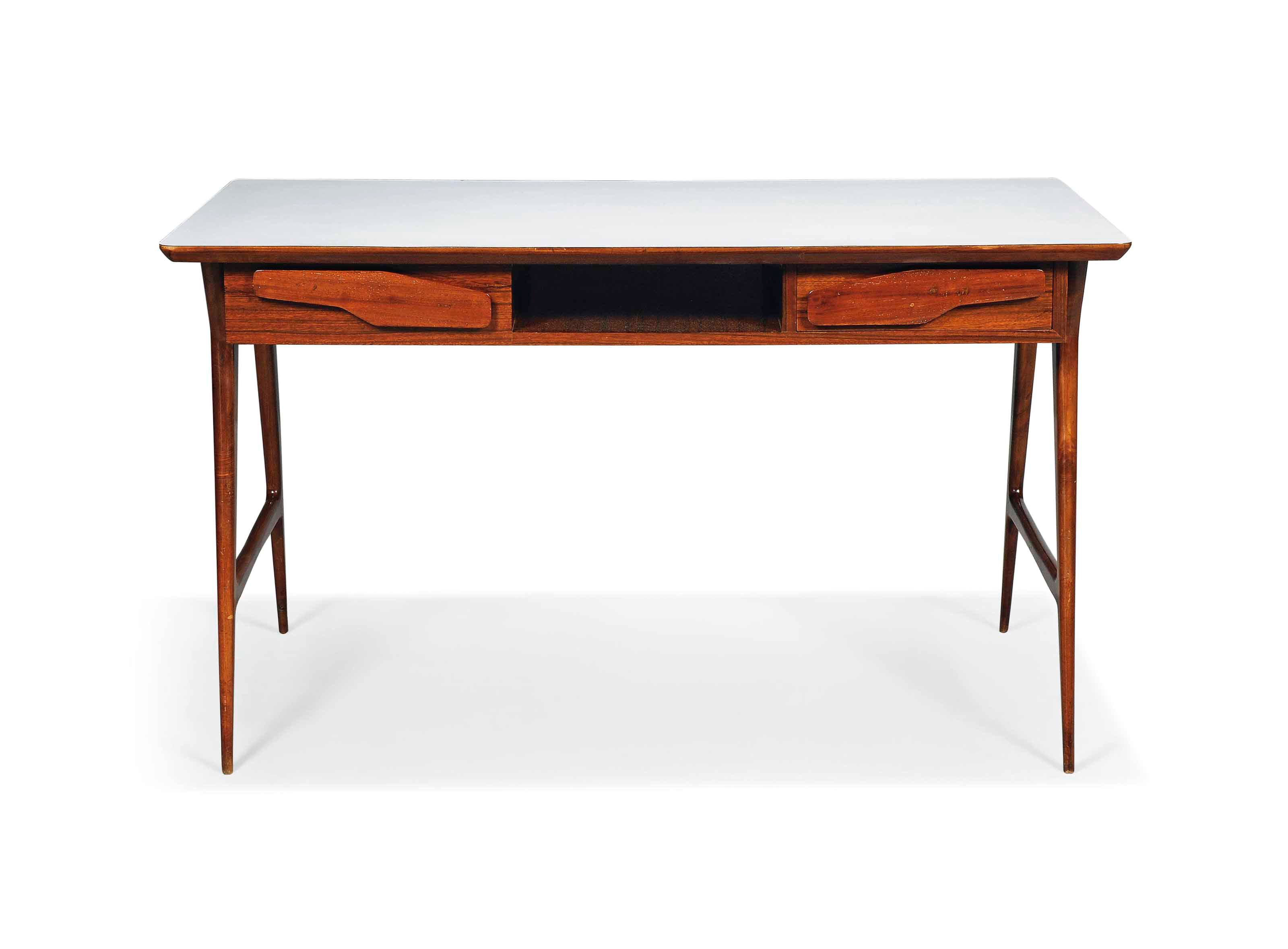 A GIO PONTI STYLE WALNUT & FORMICA TOPED DESK