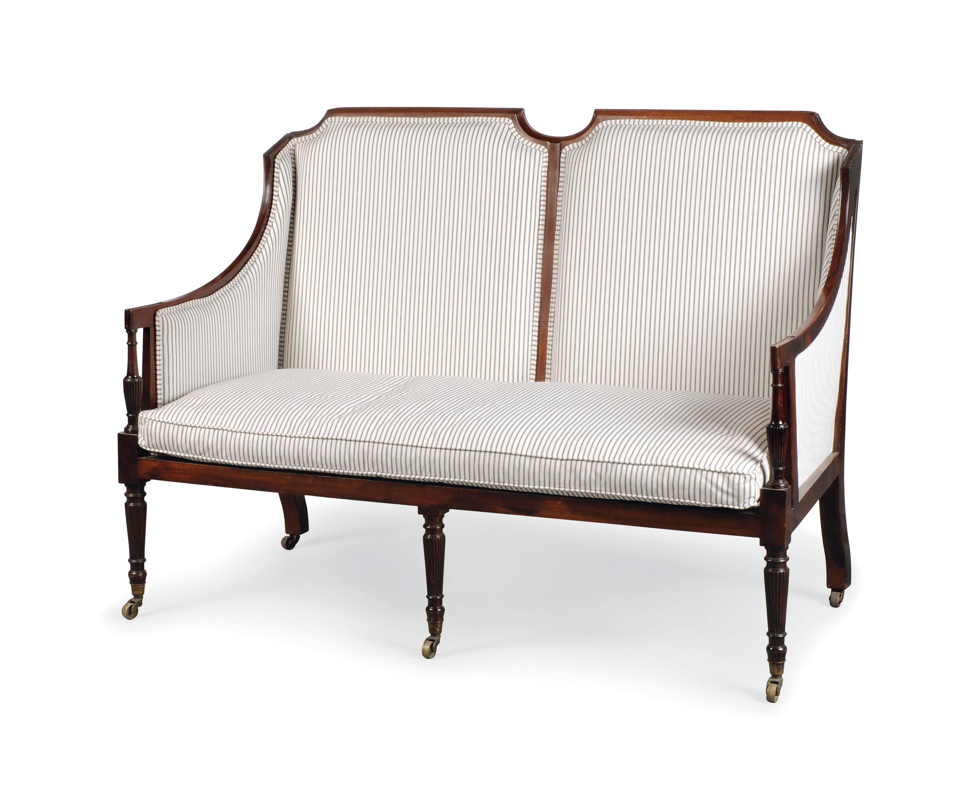 AN EDWARDIAN MAHOGANY SOFA