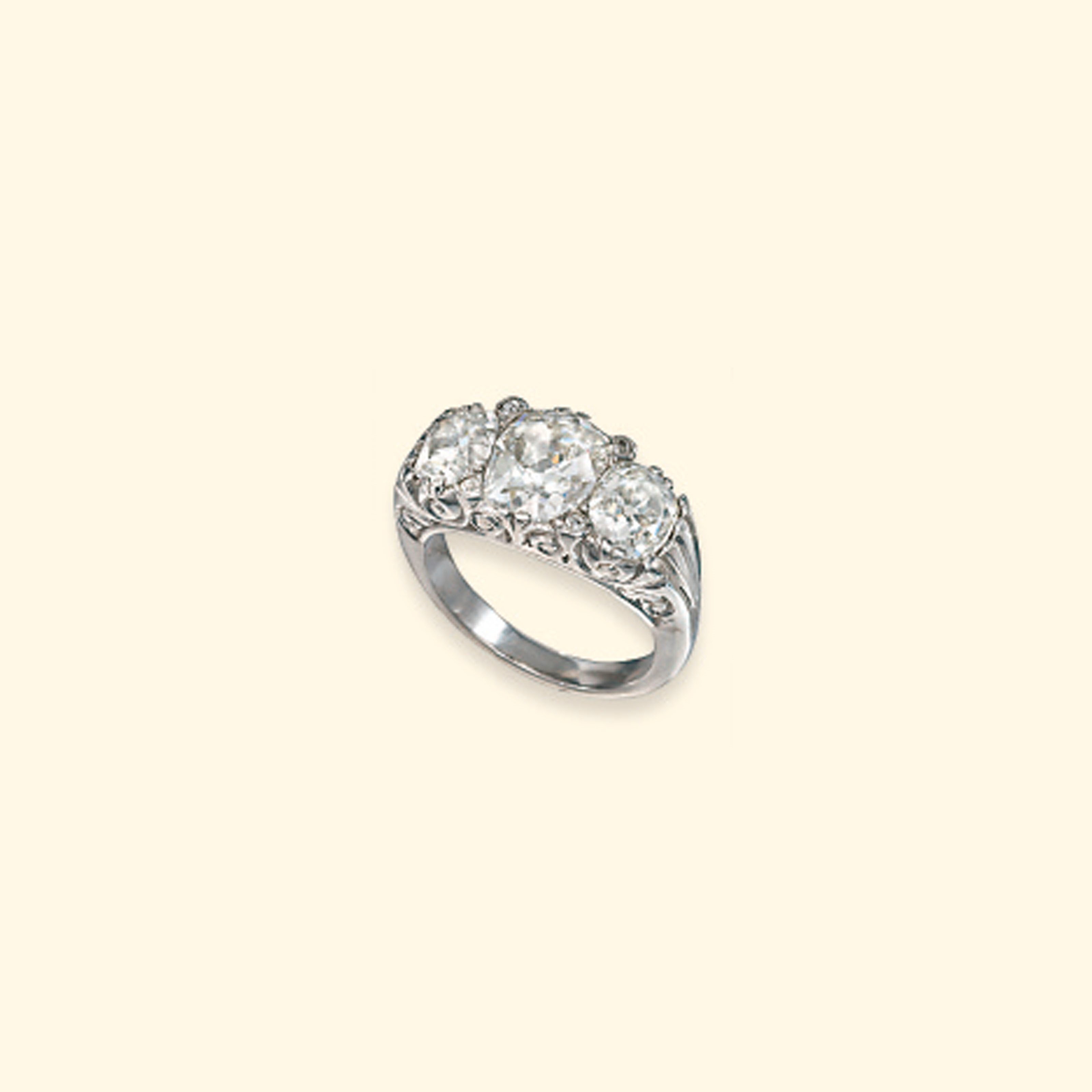 A DIAMOND THREE-STONE RING