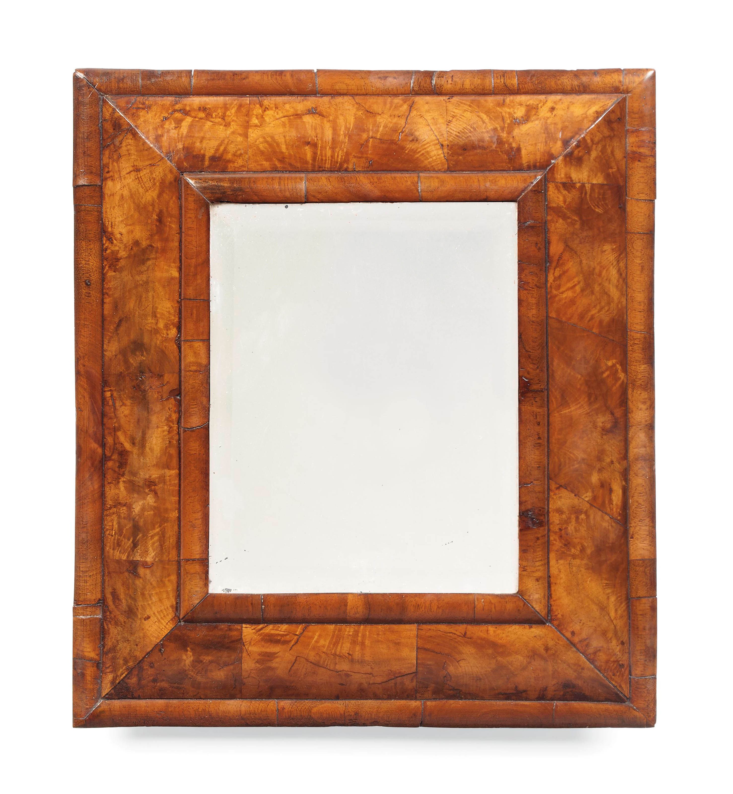 A SMALL WILLIAM AND MARY WALNUT MIRROR