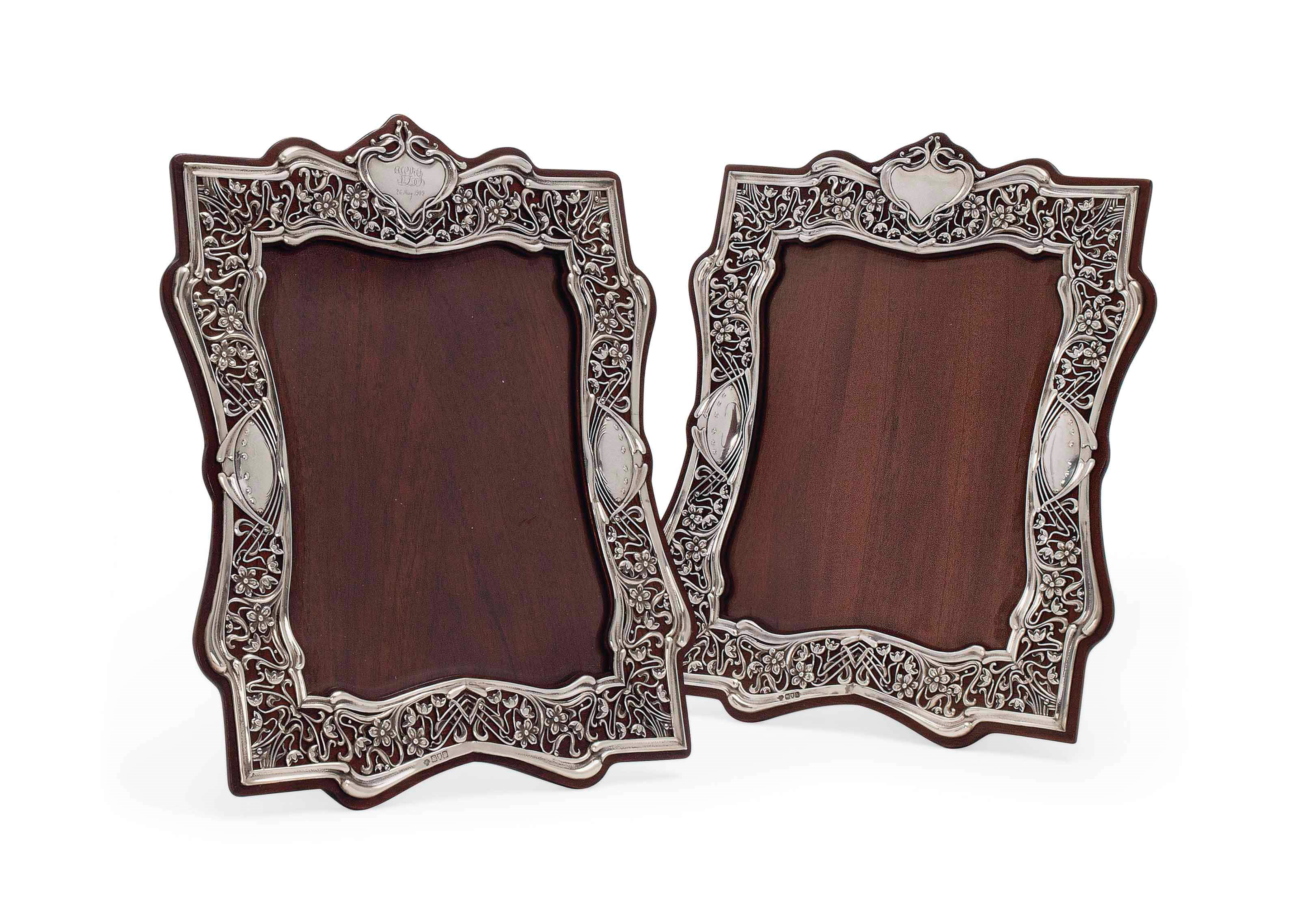 A MATCHED PAIR OF VERY LARGE EDWARDIAN SILVER PHOTOGRAPH FRAMES