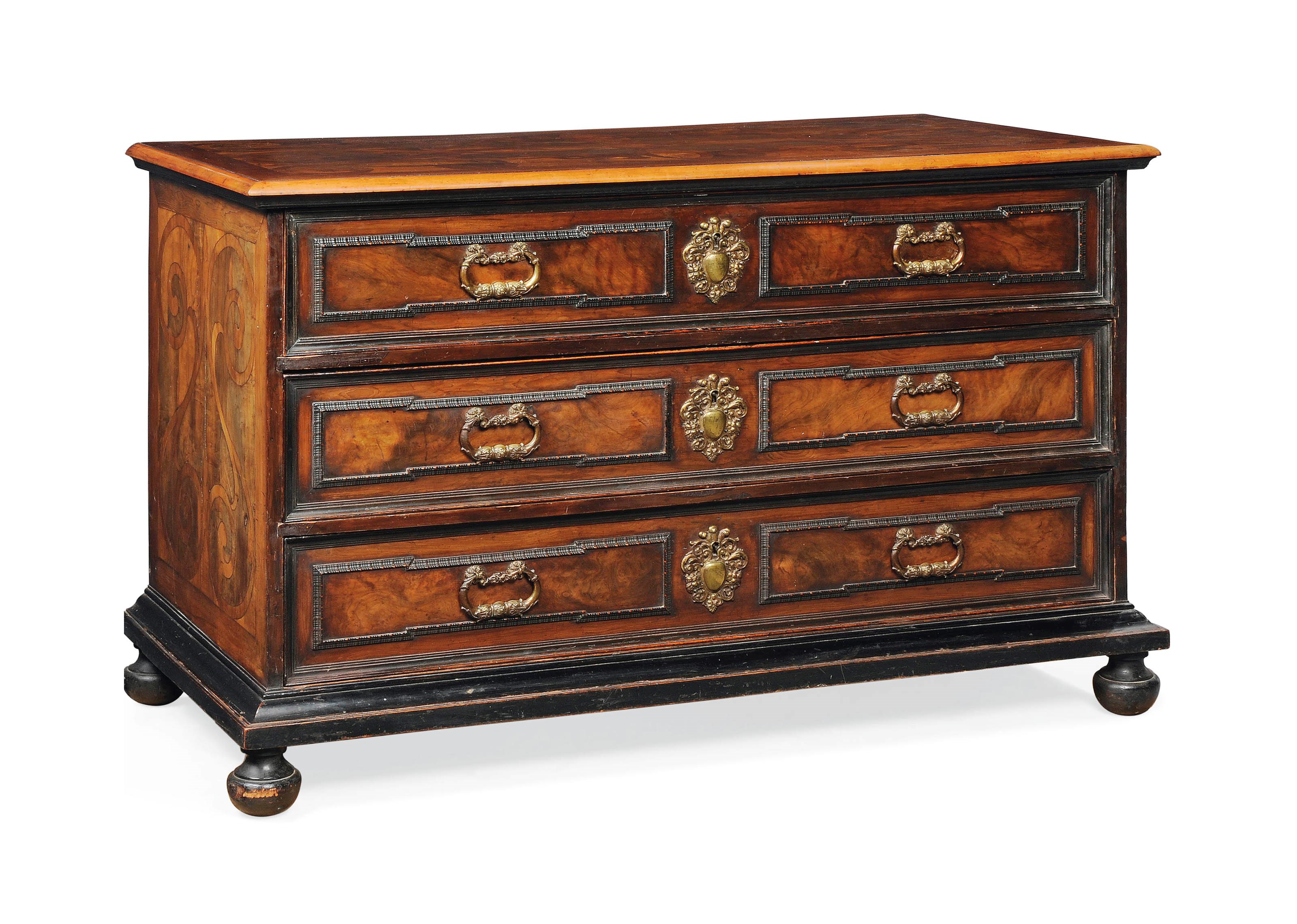AN ITALIAN WALNUT AND CEDAR MARQUETRY COMMODE