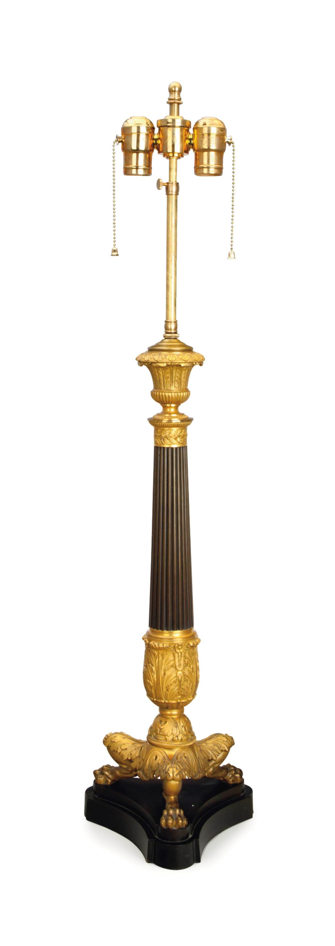 A LOUIS PHILIPPE ORMOLU AND PATINATED-BRONZE COLUMNAR FORM TABLE LAMP,