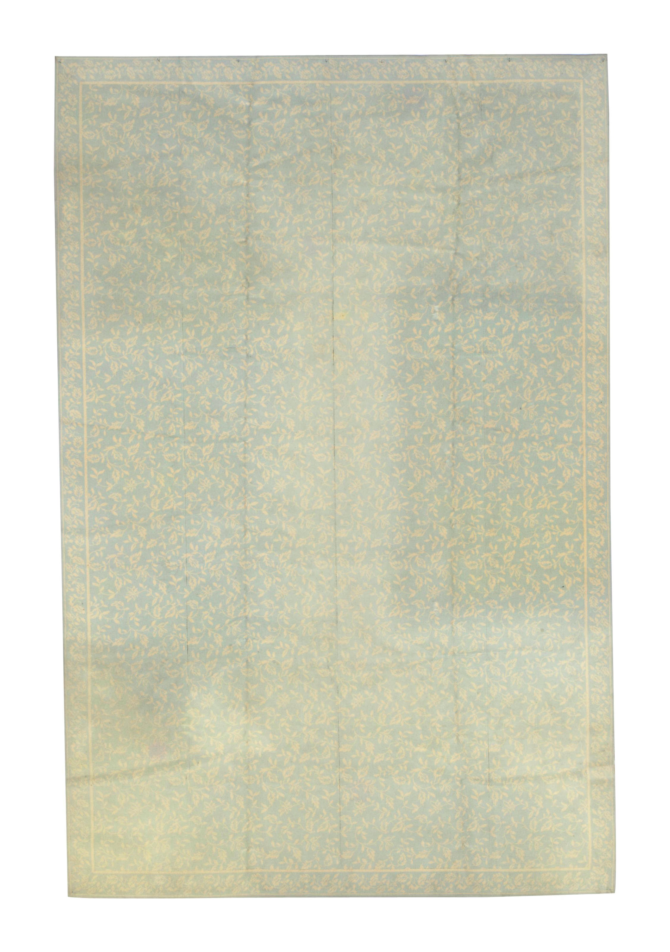 A MACHINE-MADE STARK CARPET,