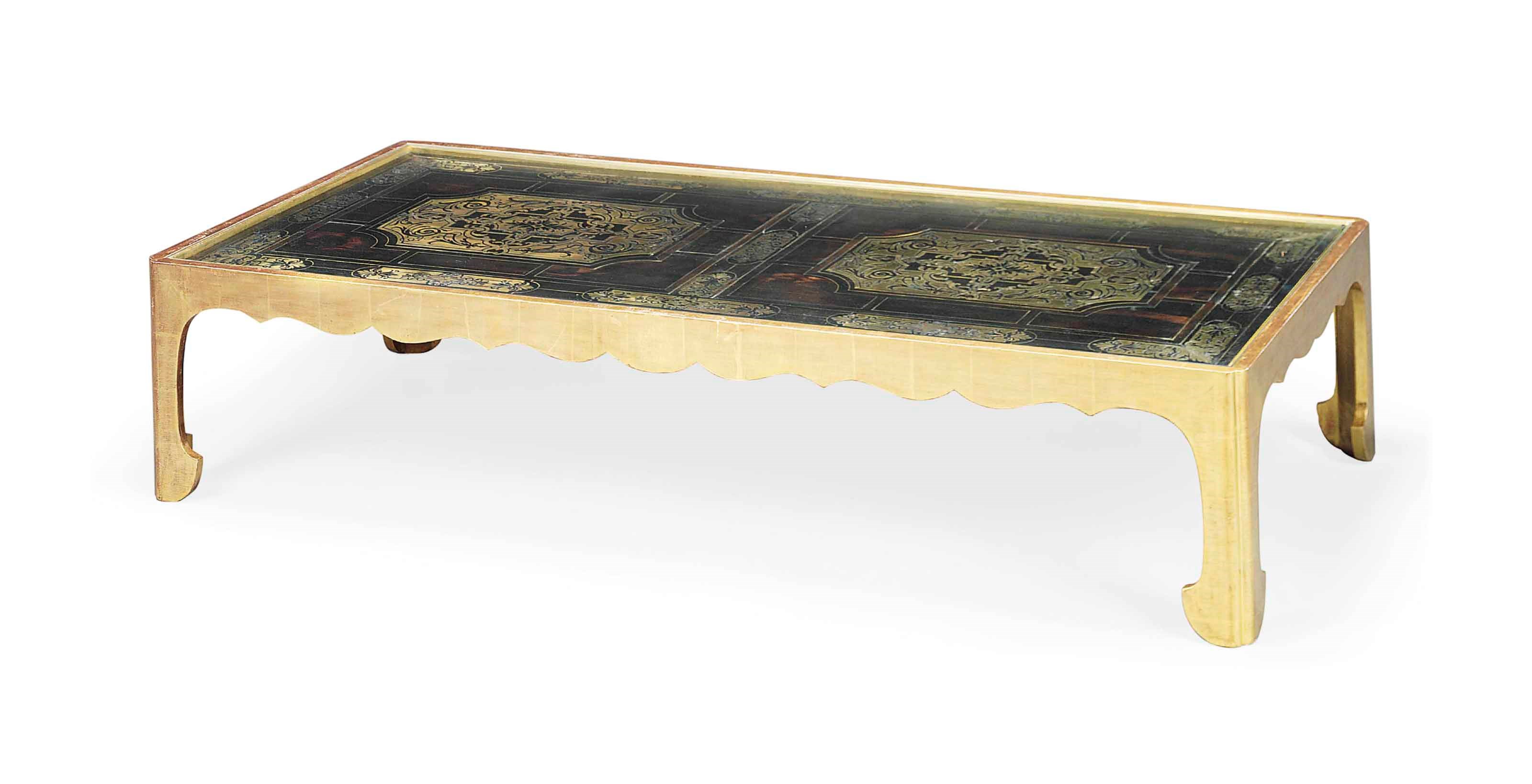 A FRENCH BRASS-INLAID EBONY PANEL NOW MOUNTED AS A LOW TABLE