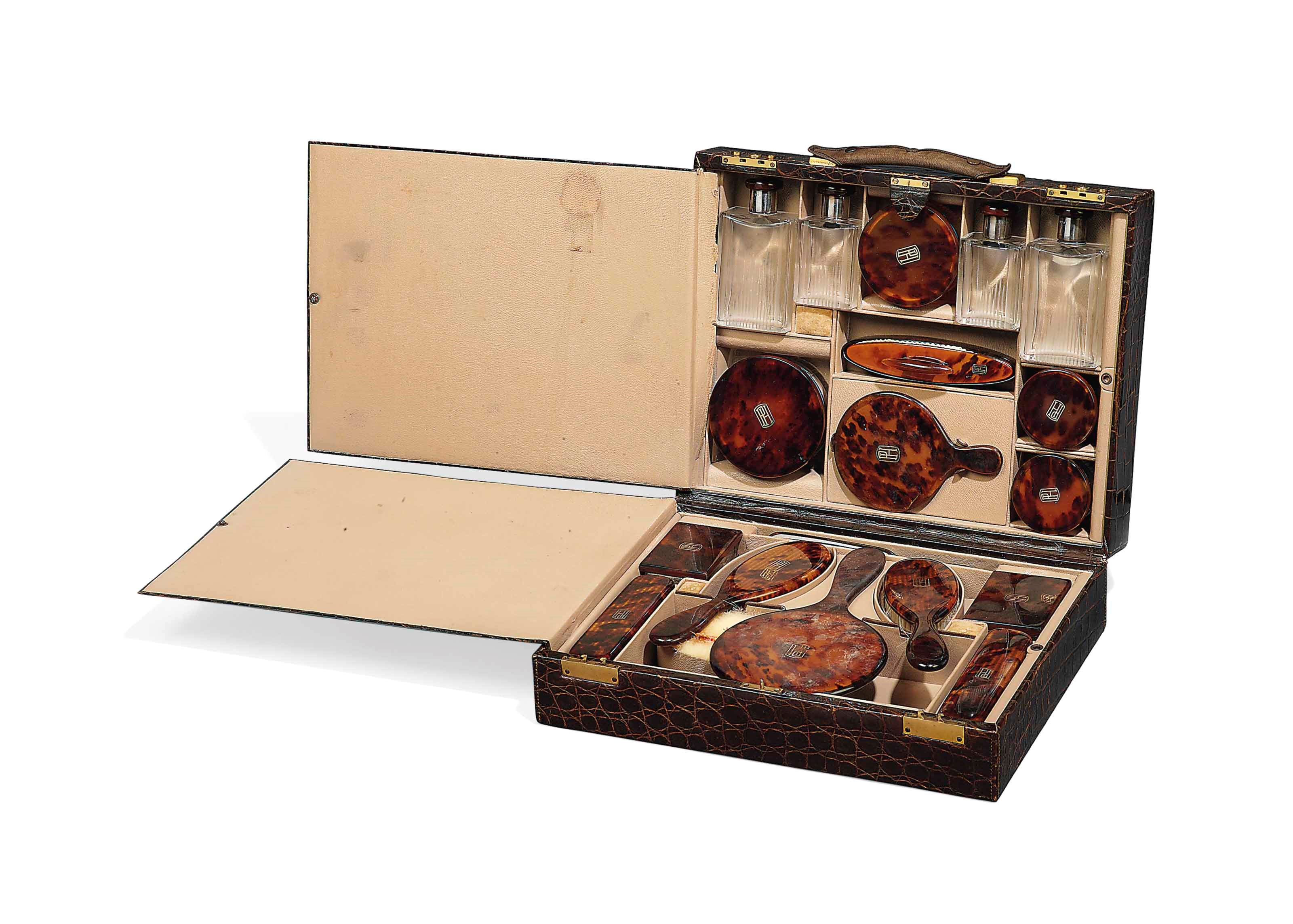 A CROCODILE SKIN DRESSING CASE