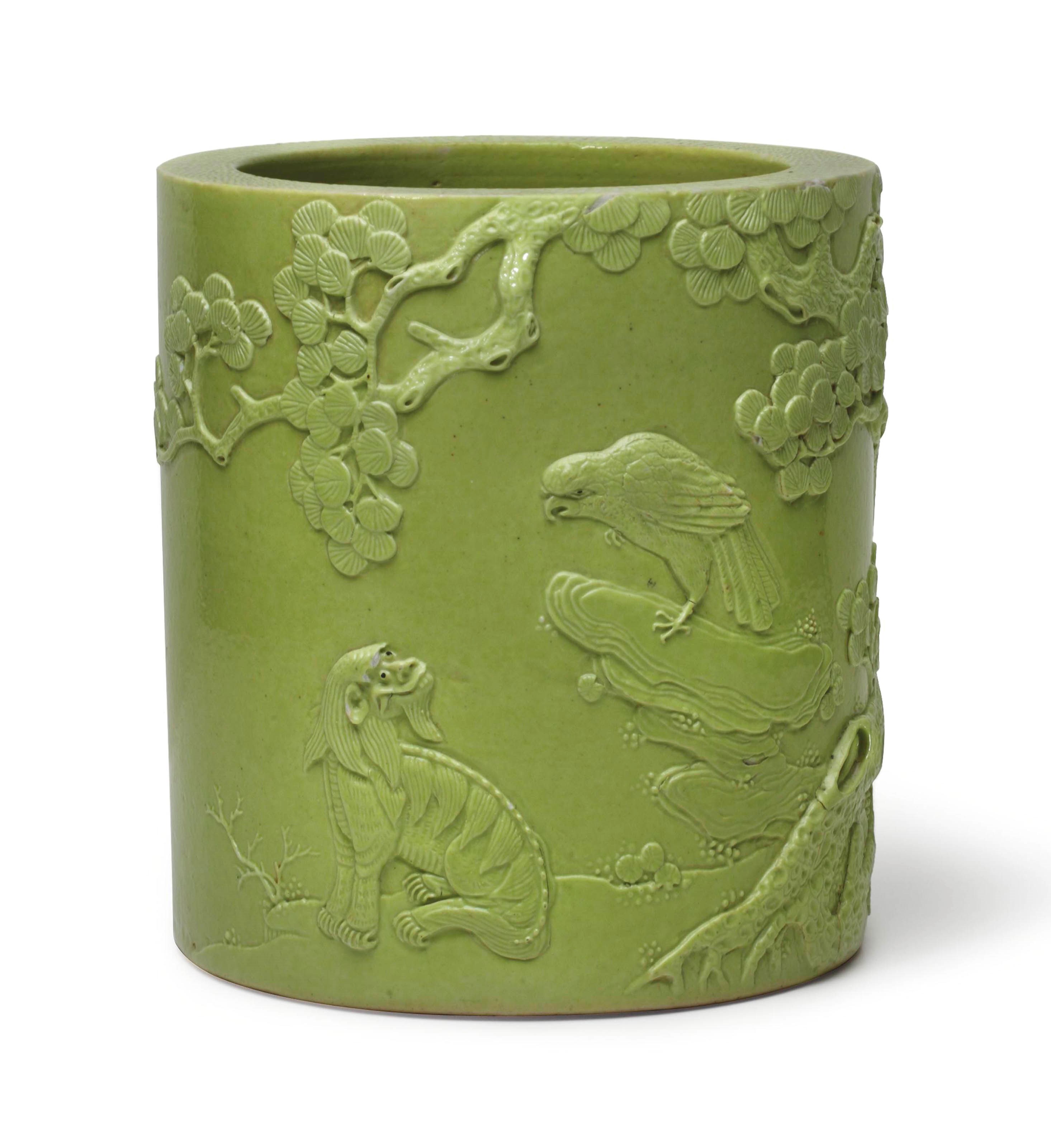 A CHINESE PALE GREEN-GLAZED BRUSH POT, BITONG,
