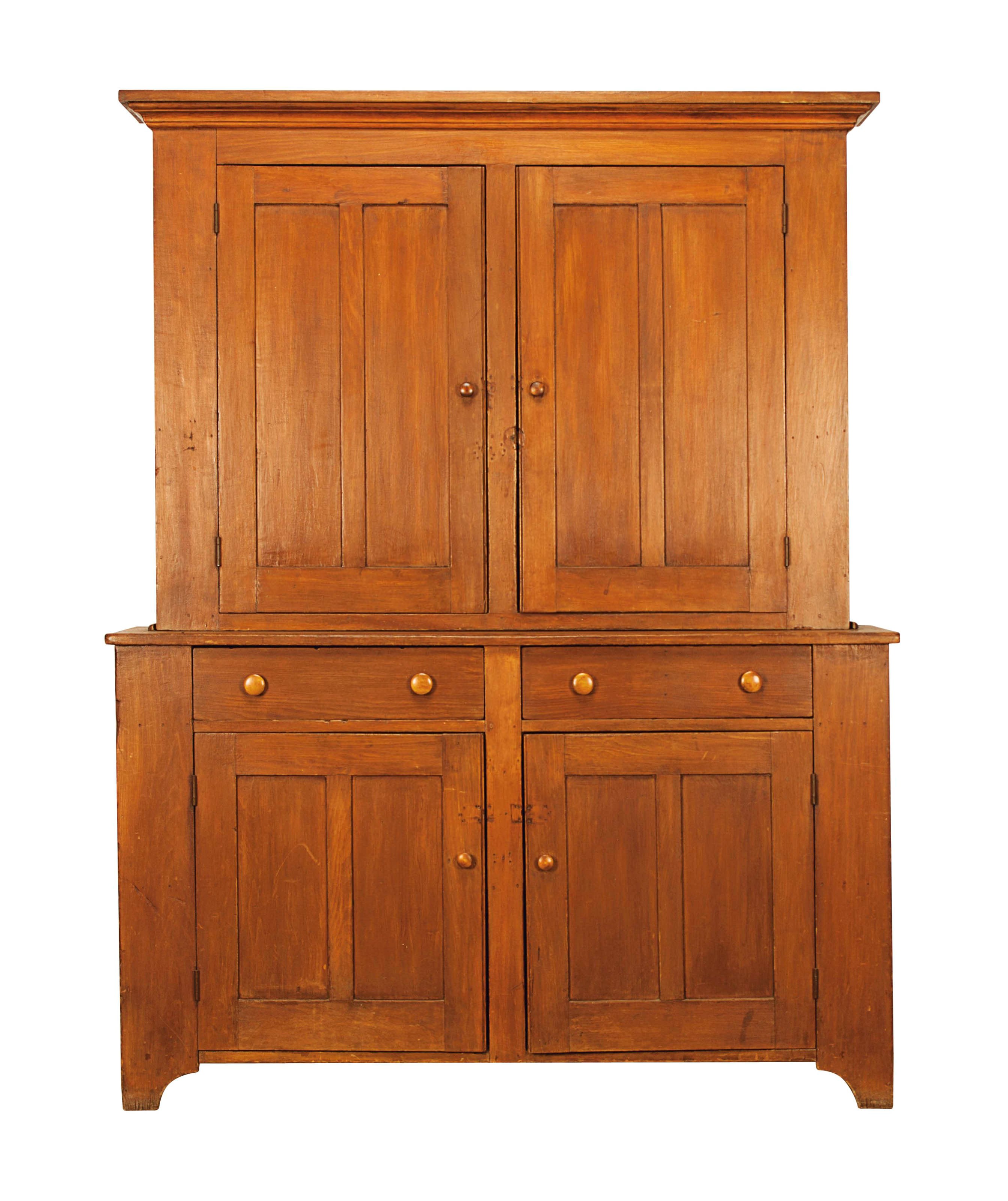 AN AMERICAN STAINED POPLAR STEP-BACK CUPBOARD,