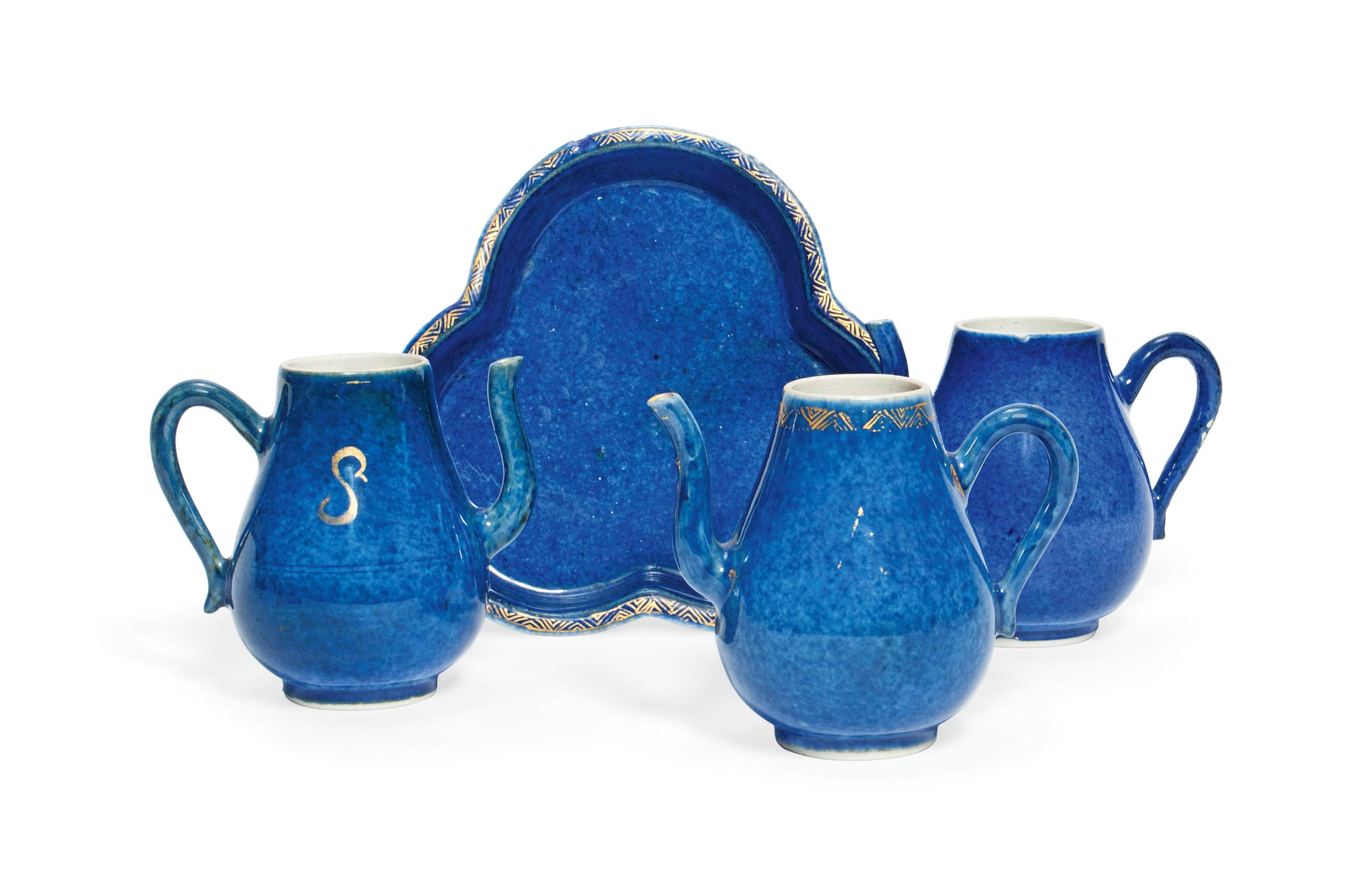 A SET OF THREE CHINESE POWDER BLUE EWERS AND TRAY