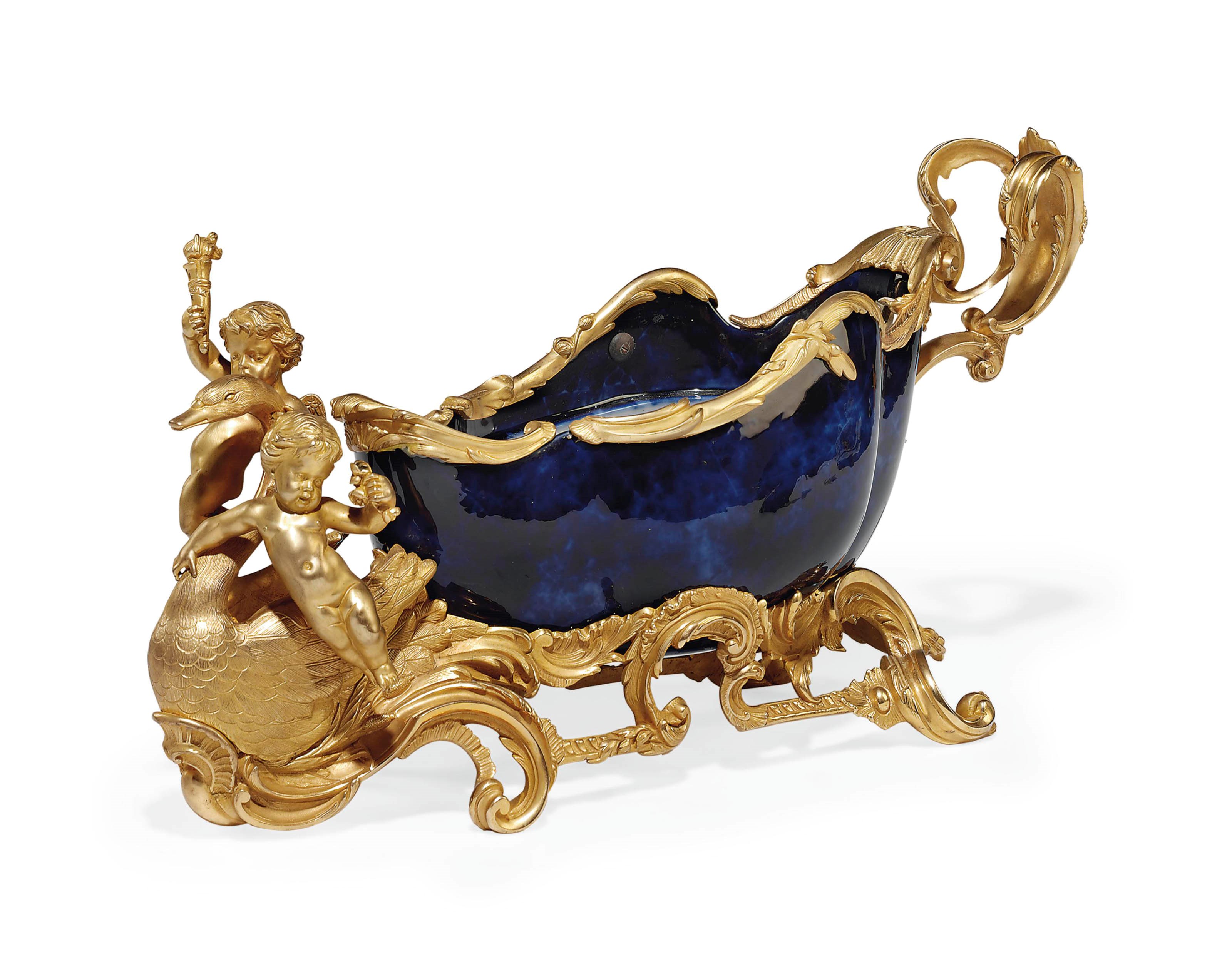 A FRENCH ORMOLU-MOUNTED 'BLEU-LAPIS' GROUND CENTREPIECE